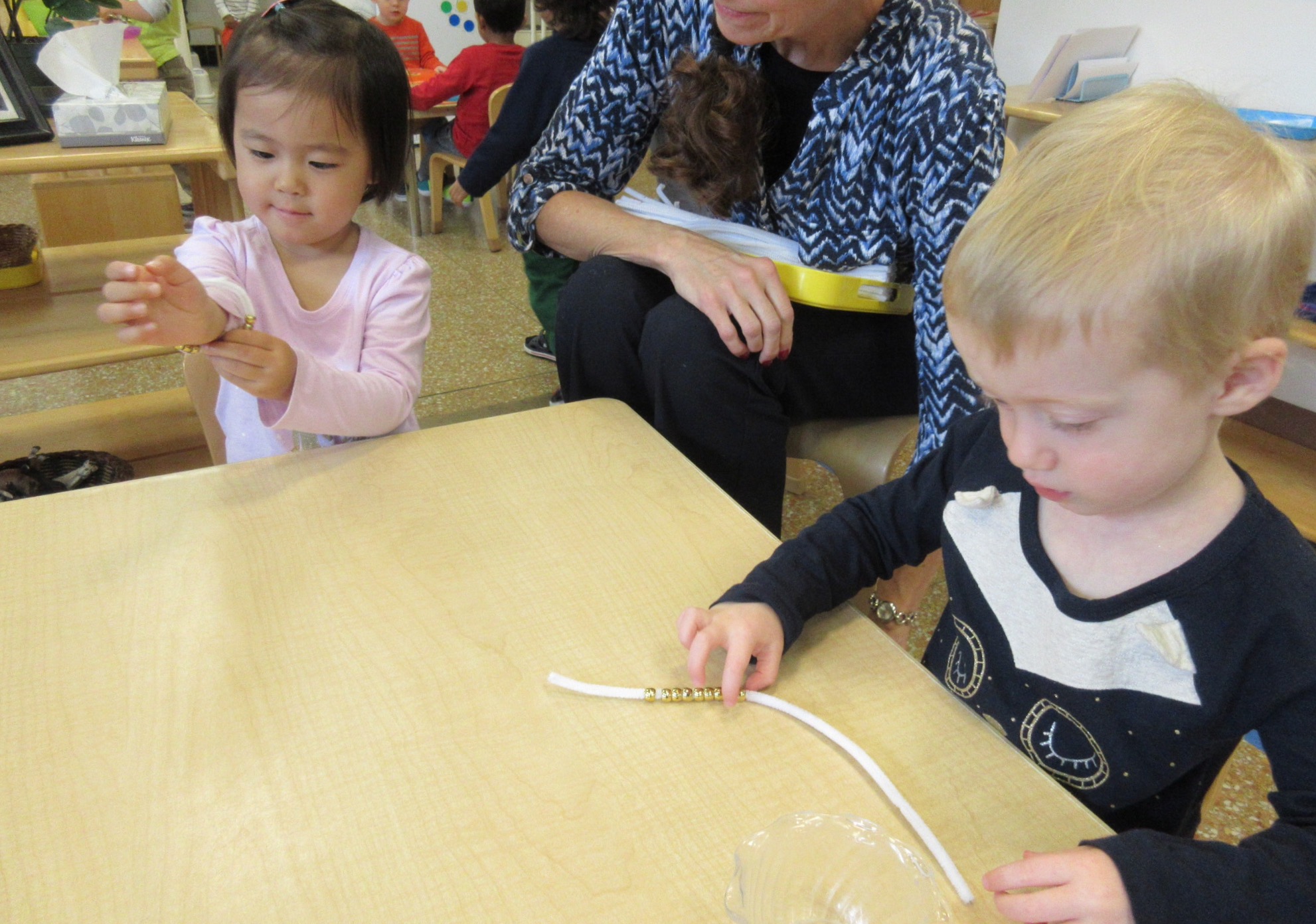 We strung 10 golden beads together to make bracelets for HPMS 10 Year Celebration!