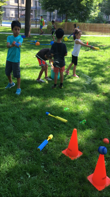 Knock the balls of the cone with the water squirter! 