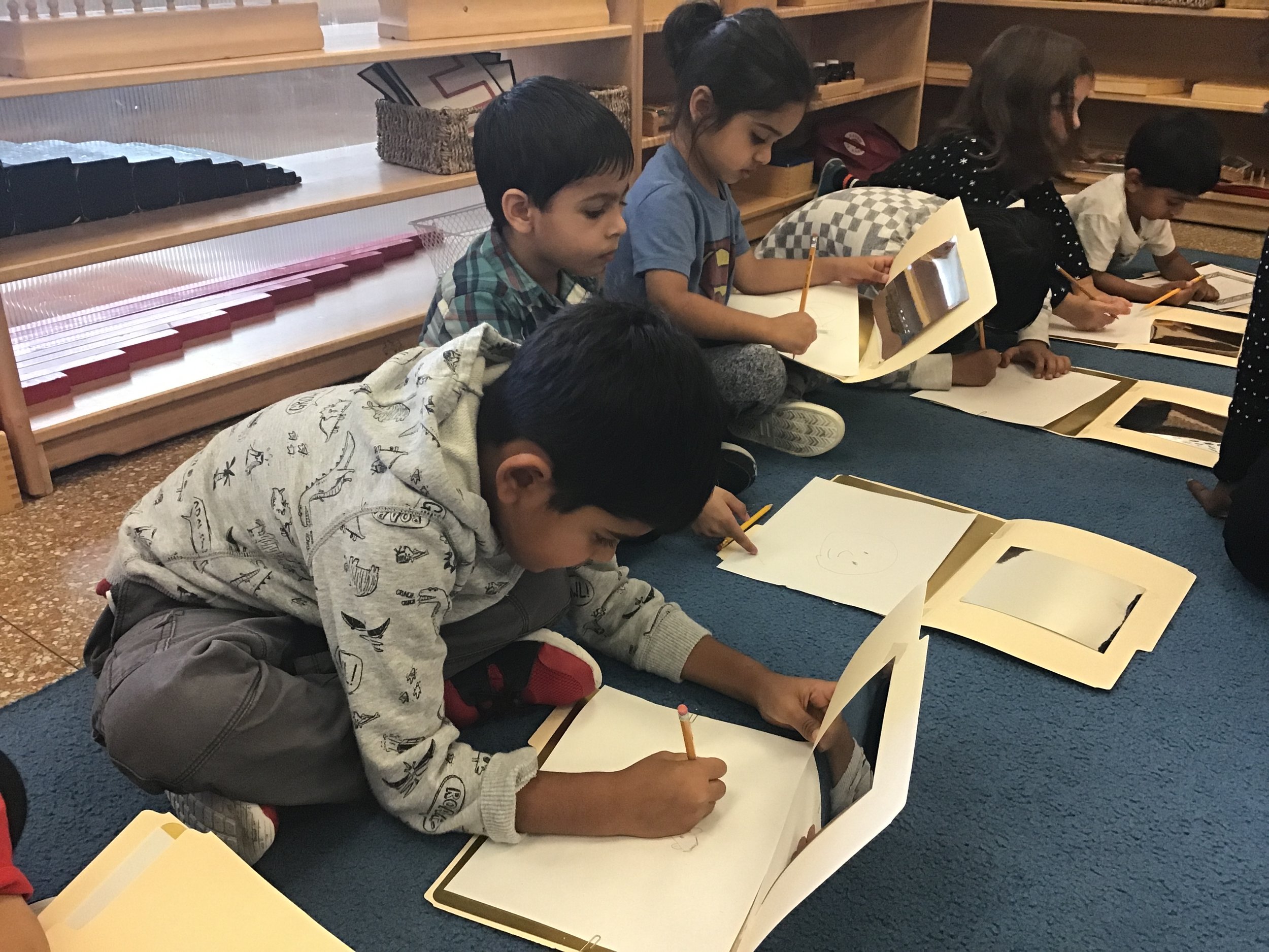 Drawing self-portraits at the author visit last Friday