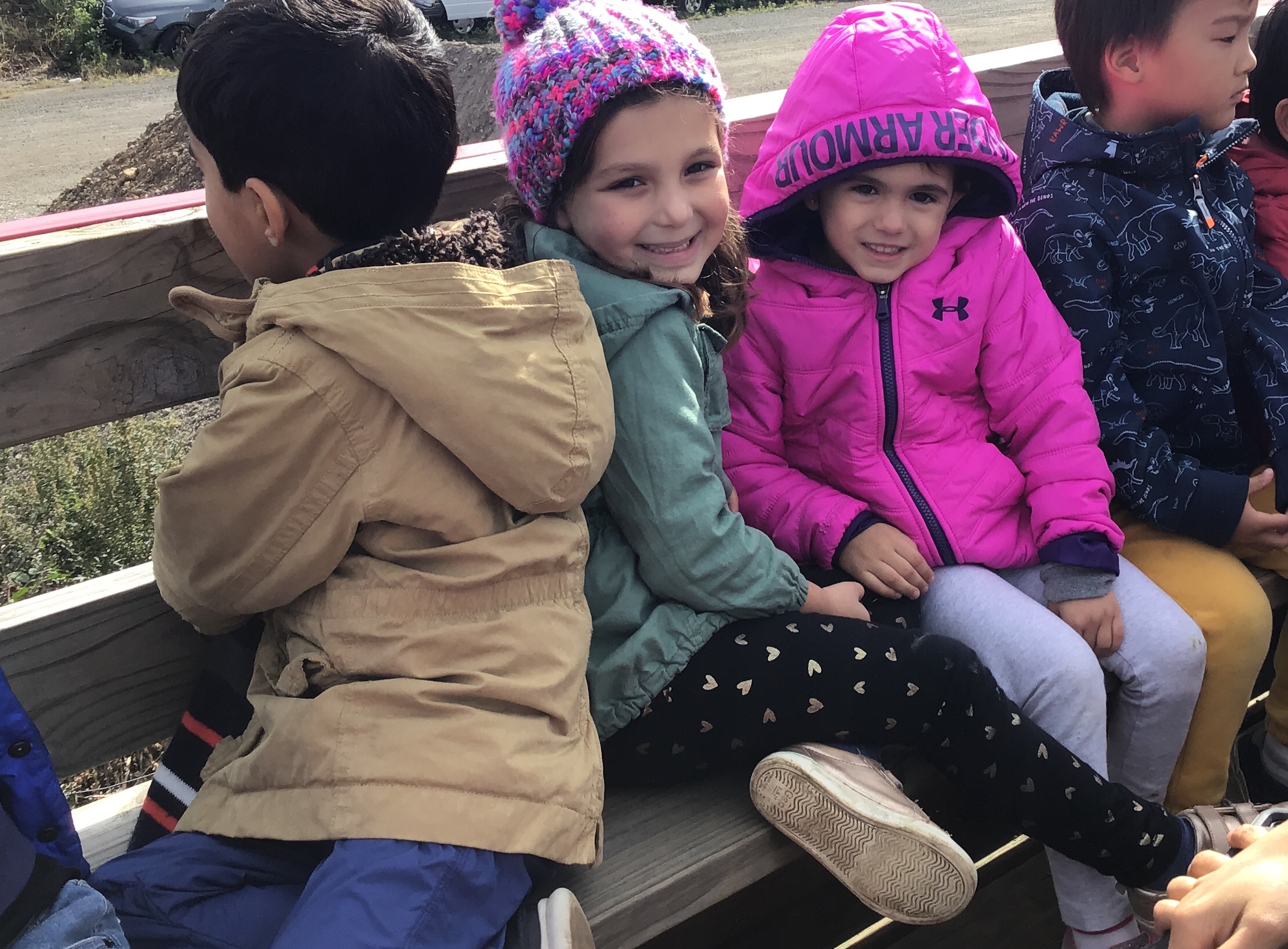 Smiles on the hayride at Abma Farm