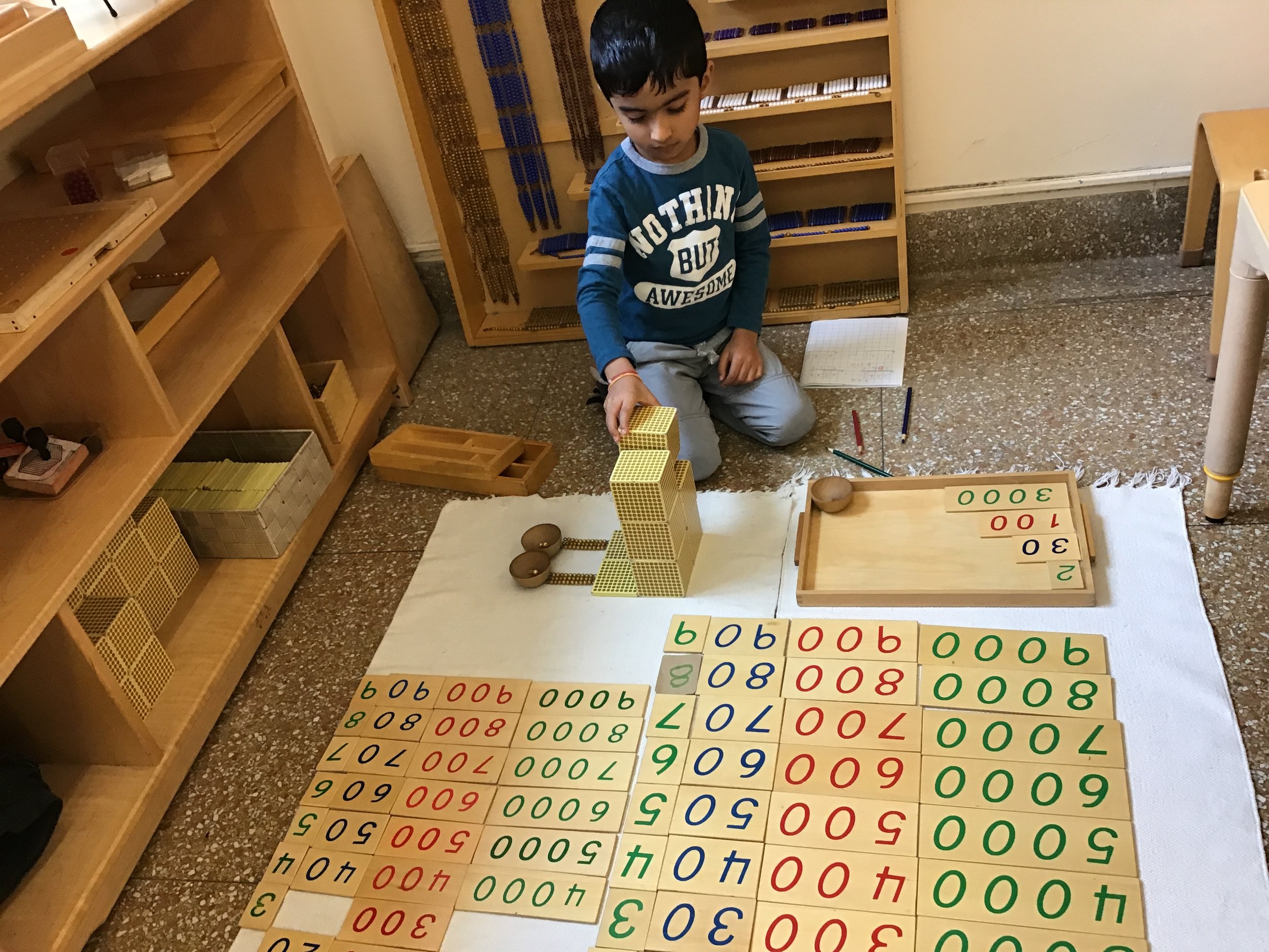 Practicing multiplication with the Golden Beads