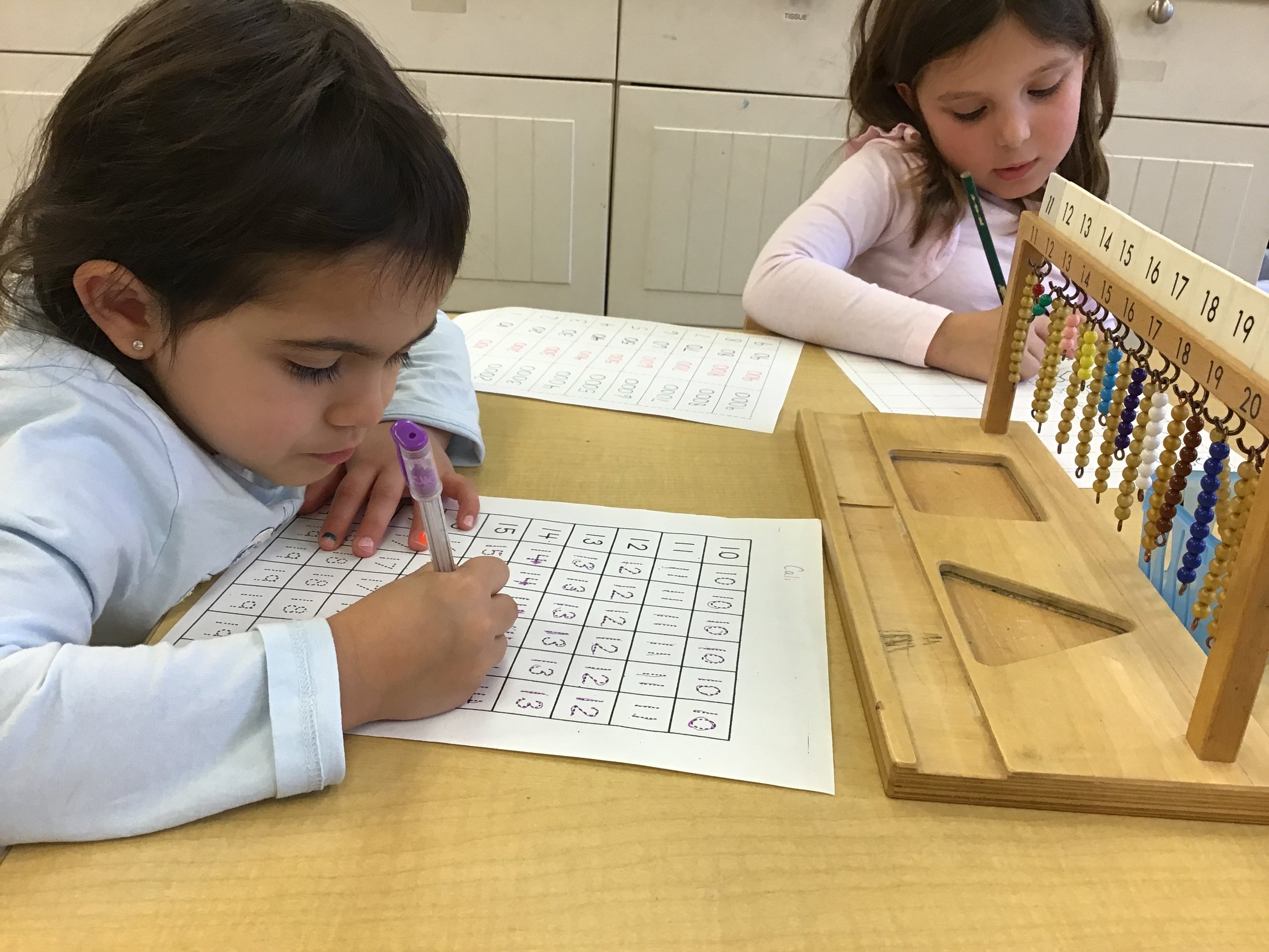 Writing teen numbers after completing the Hanging Teens