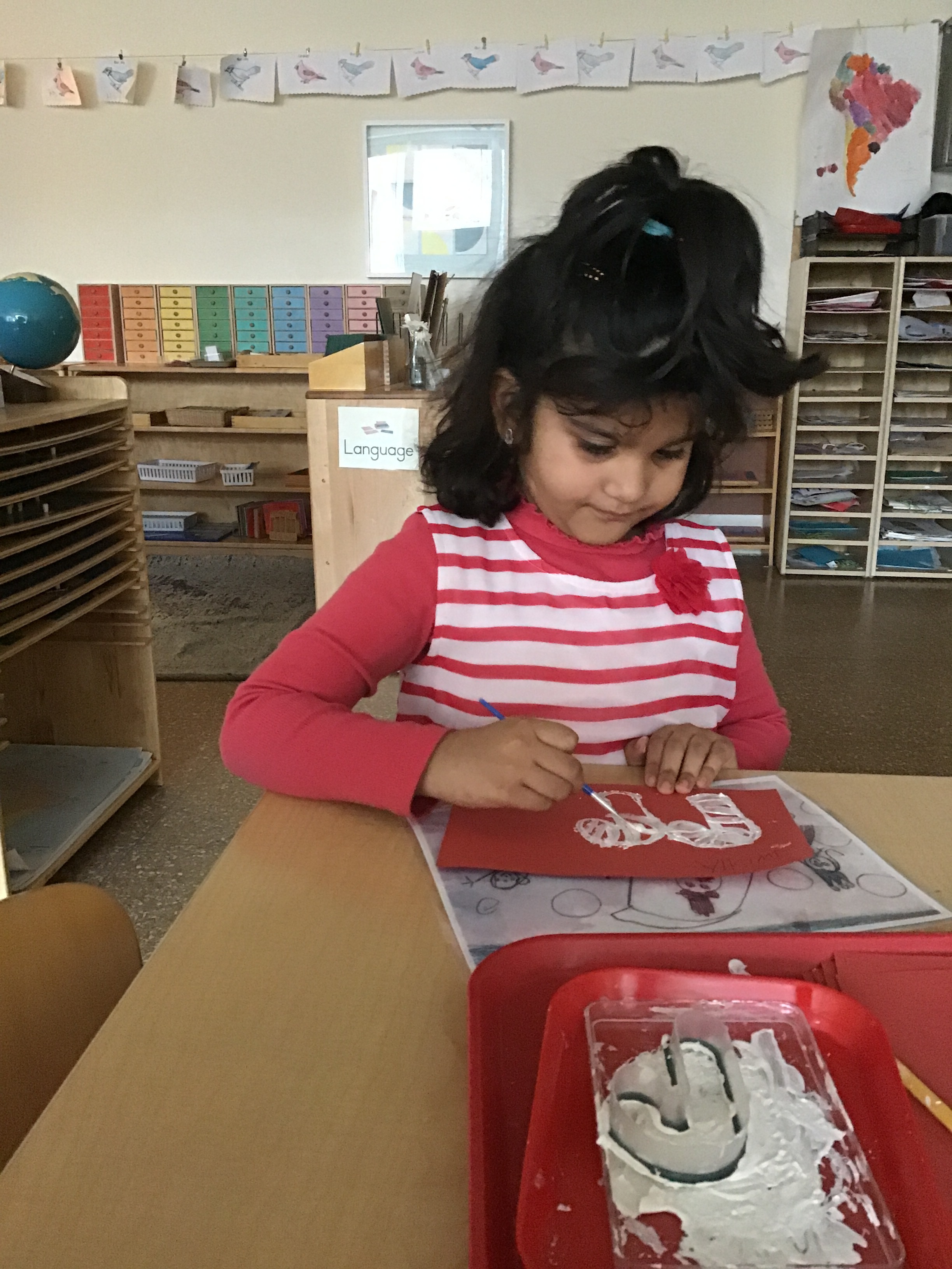 Painting stripes on candy canes