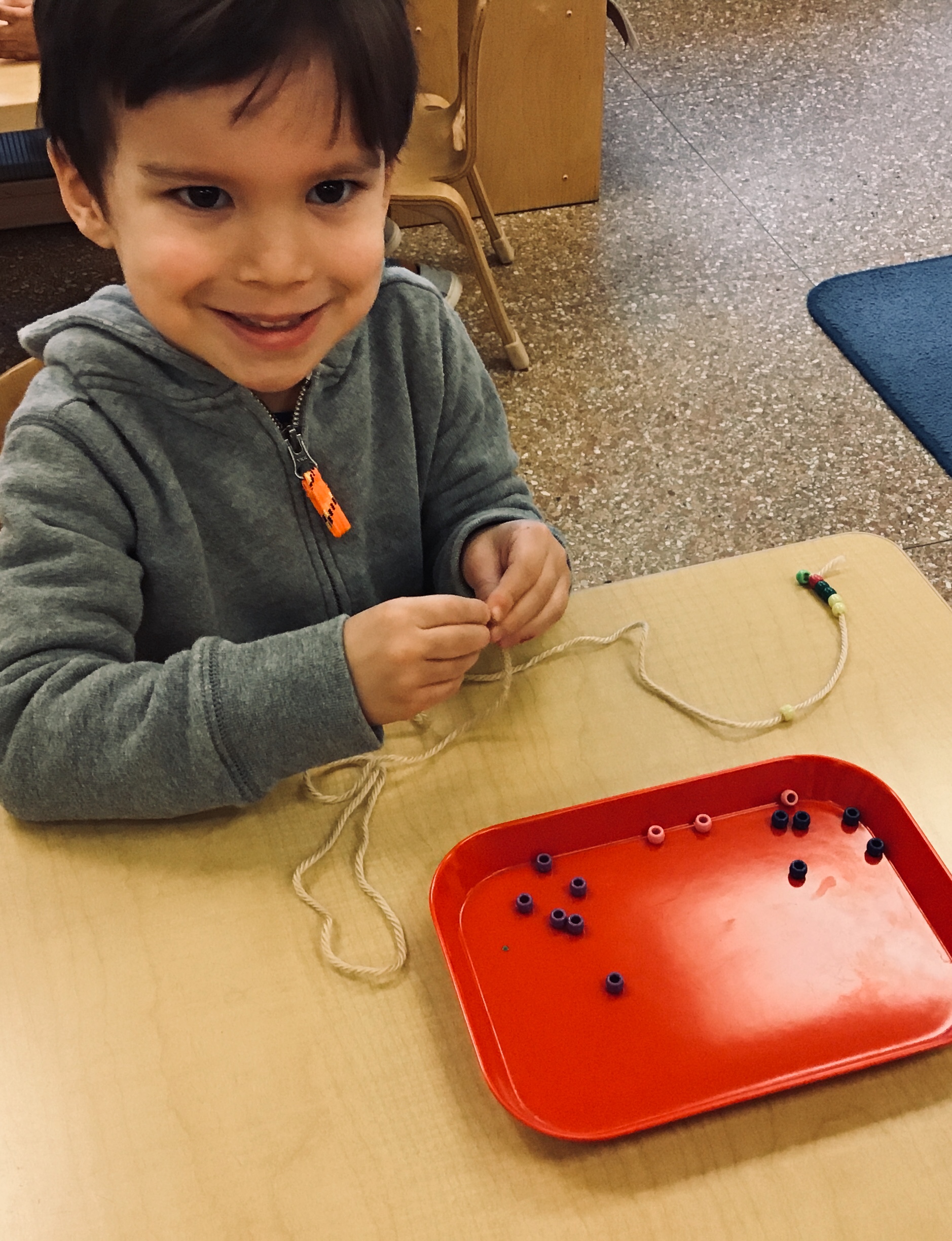 Making a necklace and practicing counting
