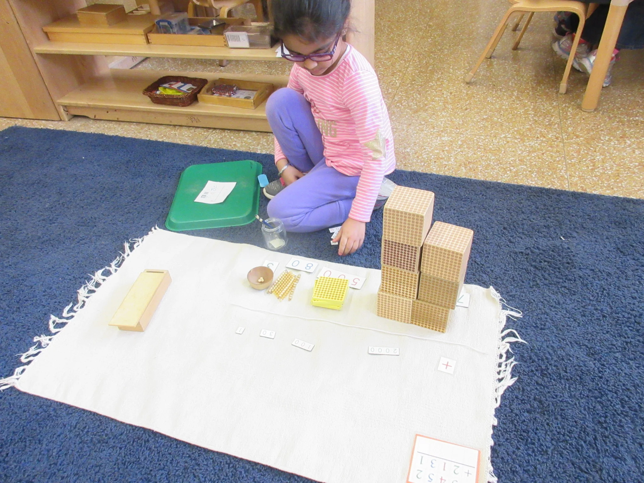 Using the Golden Beads to add large numbers!