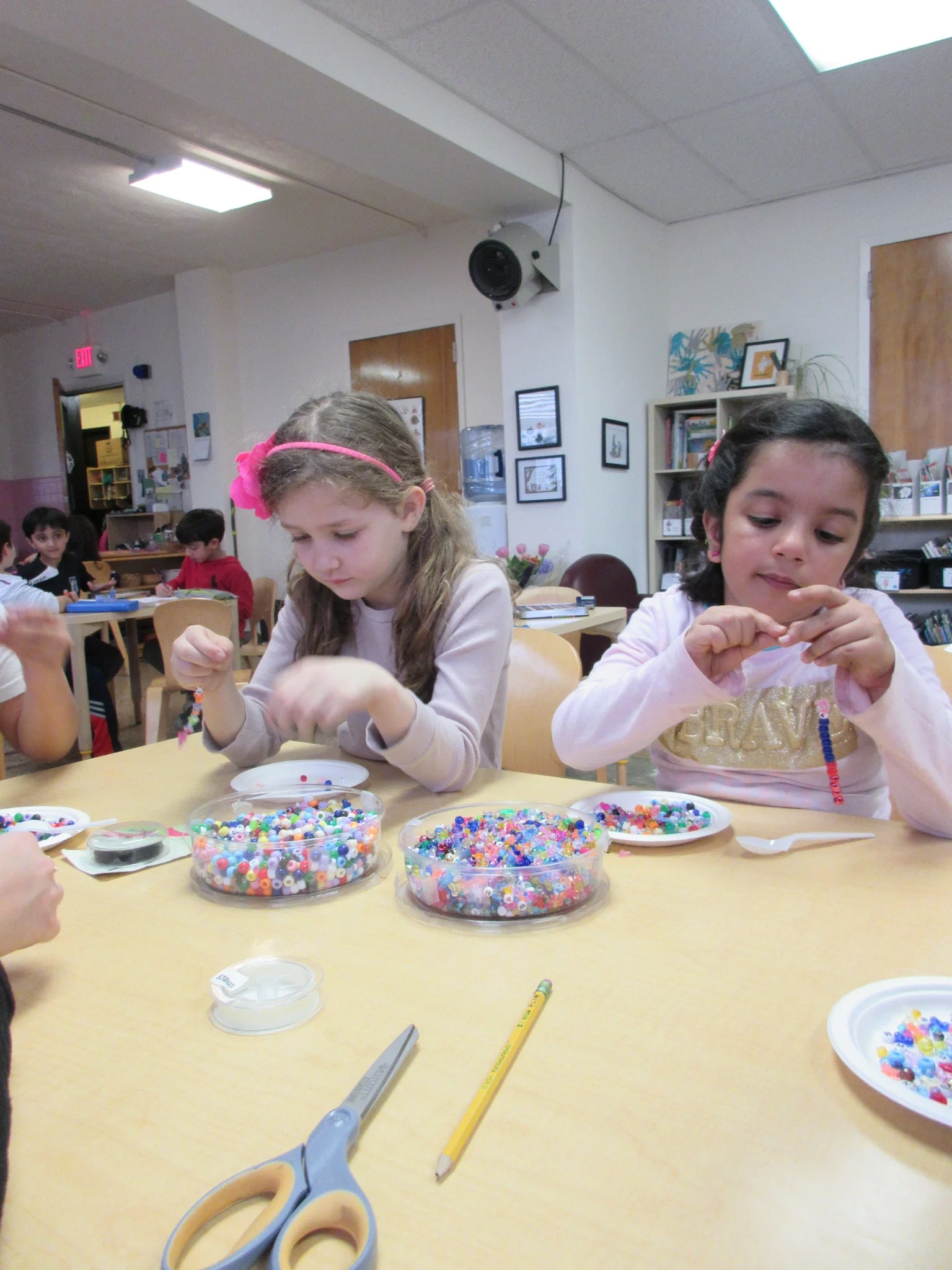 Making bracelets to show off our vanity!