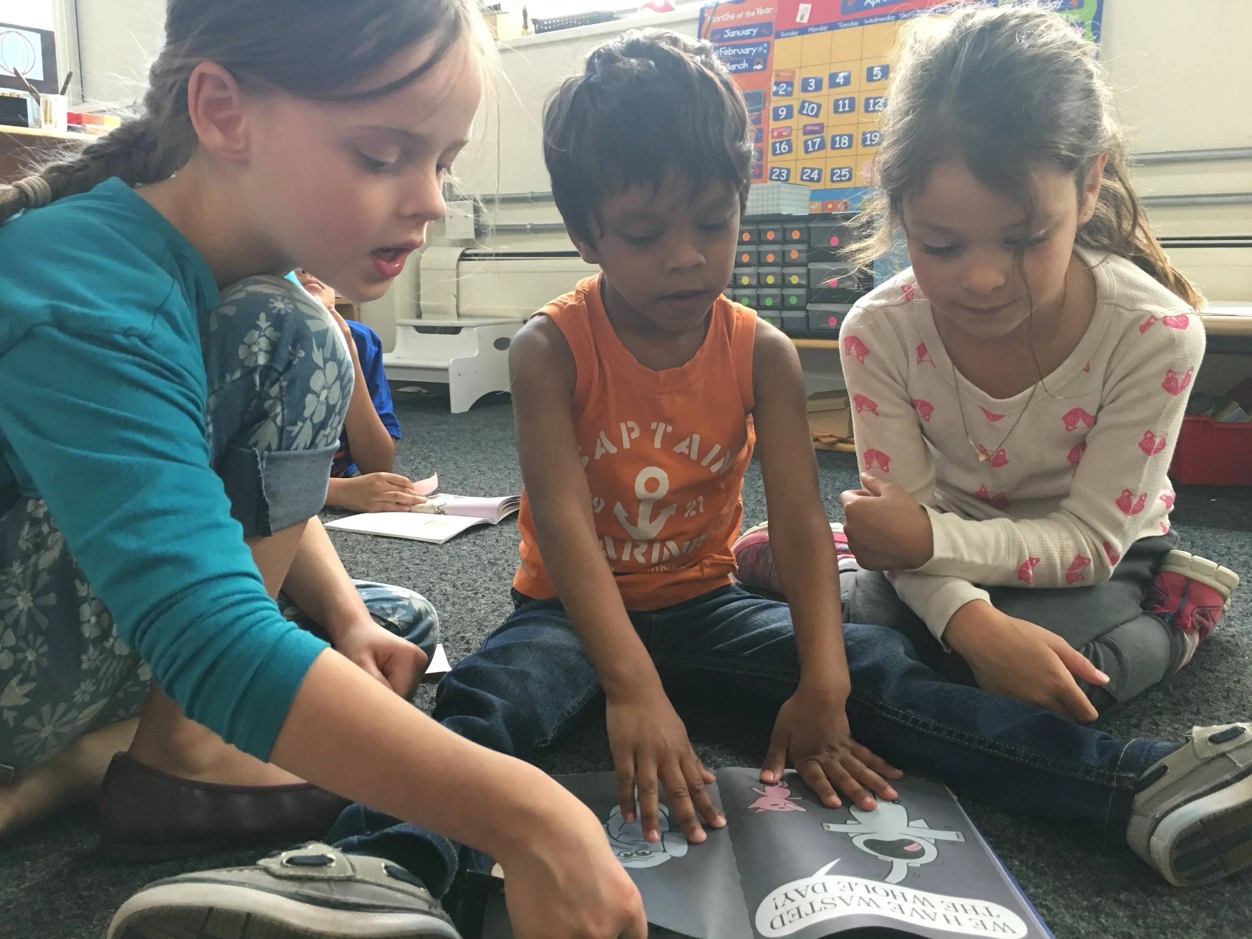 Enjoying a good book with our reading buddies