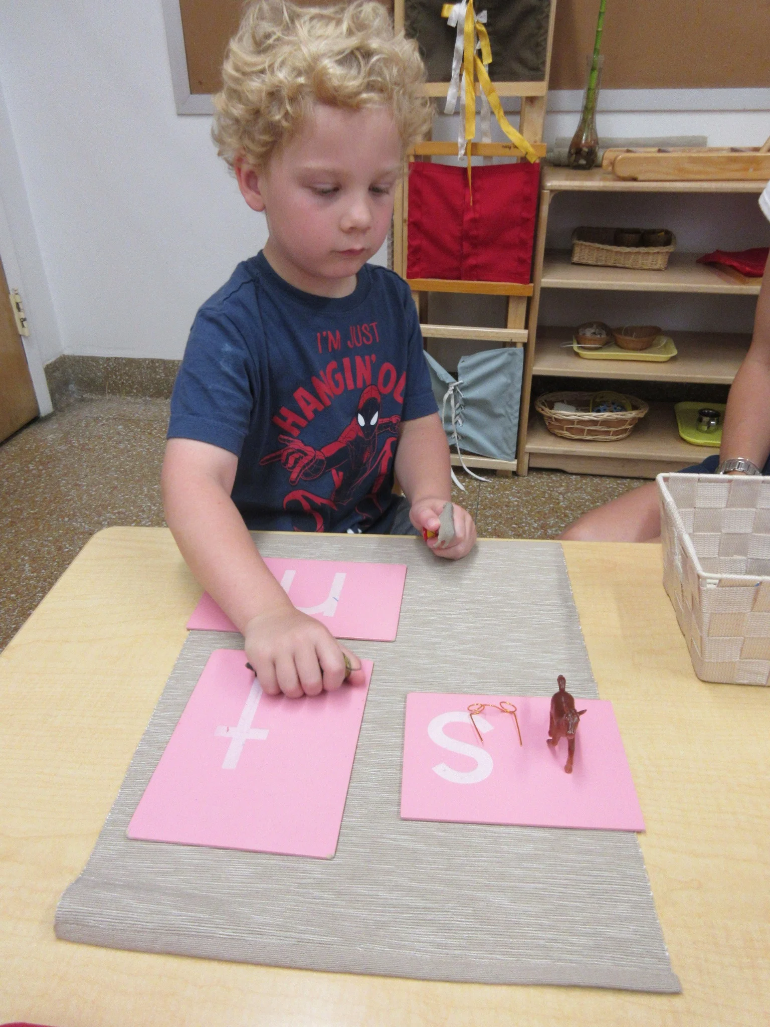 Practicing ending sounds with little objects.