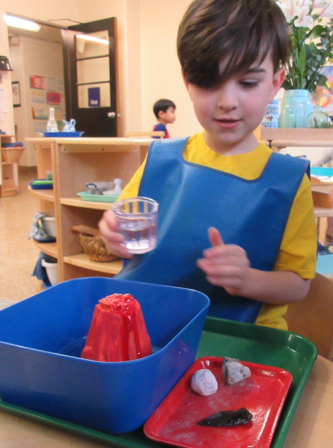 As we learn about the inside of the earth and volcanos, experimenting with the "erupting" volcano model has been a lot of fun!