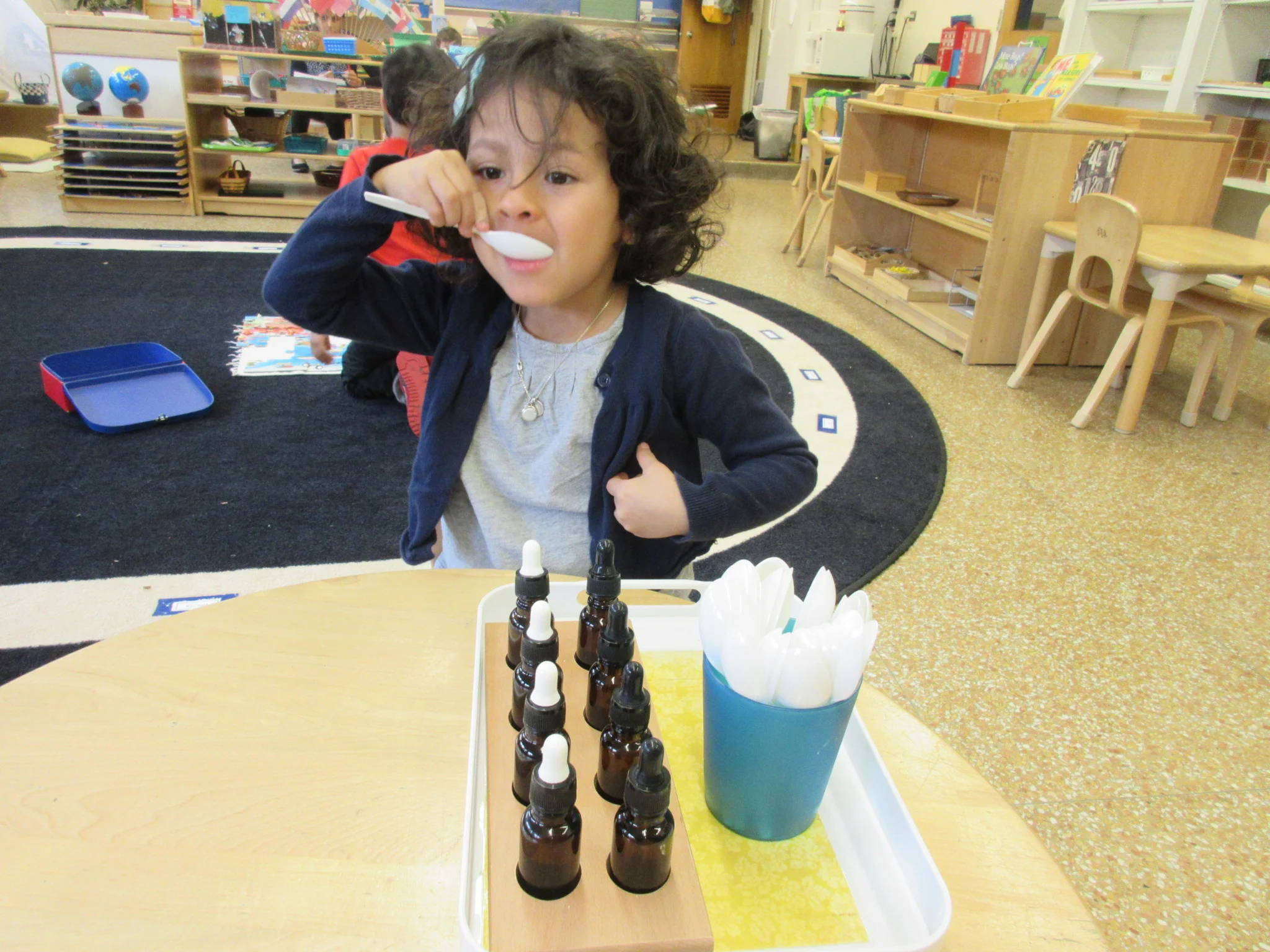 After a whole group tasting lesson, where we discovered bitter, sweet, salty, and sour flavors, she tried matching flavors independently 