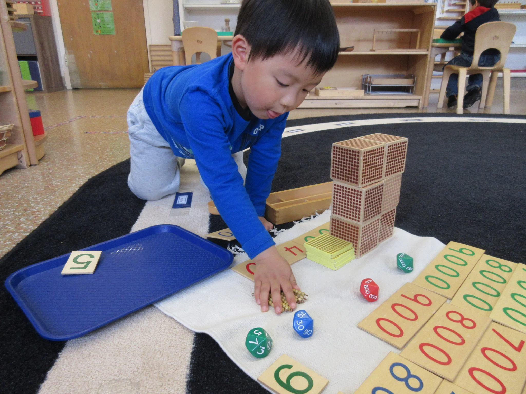 Forming numbers with the Golden Beads 