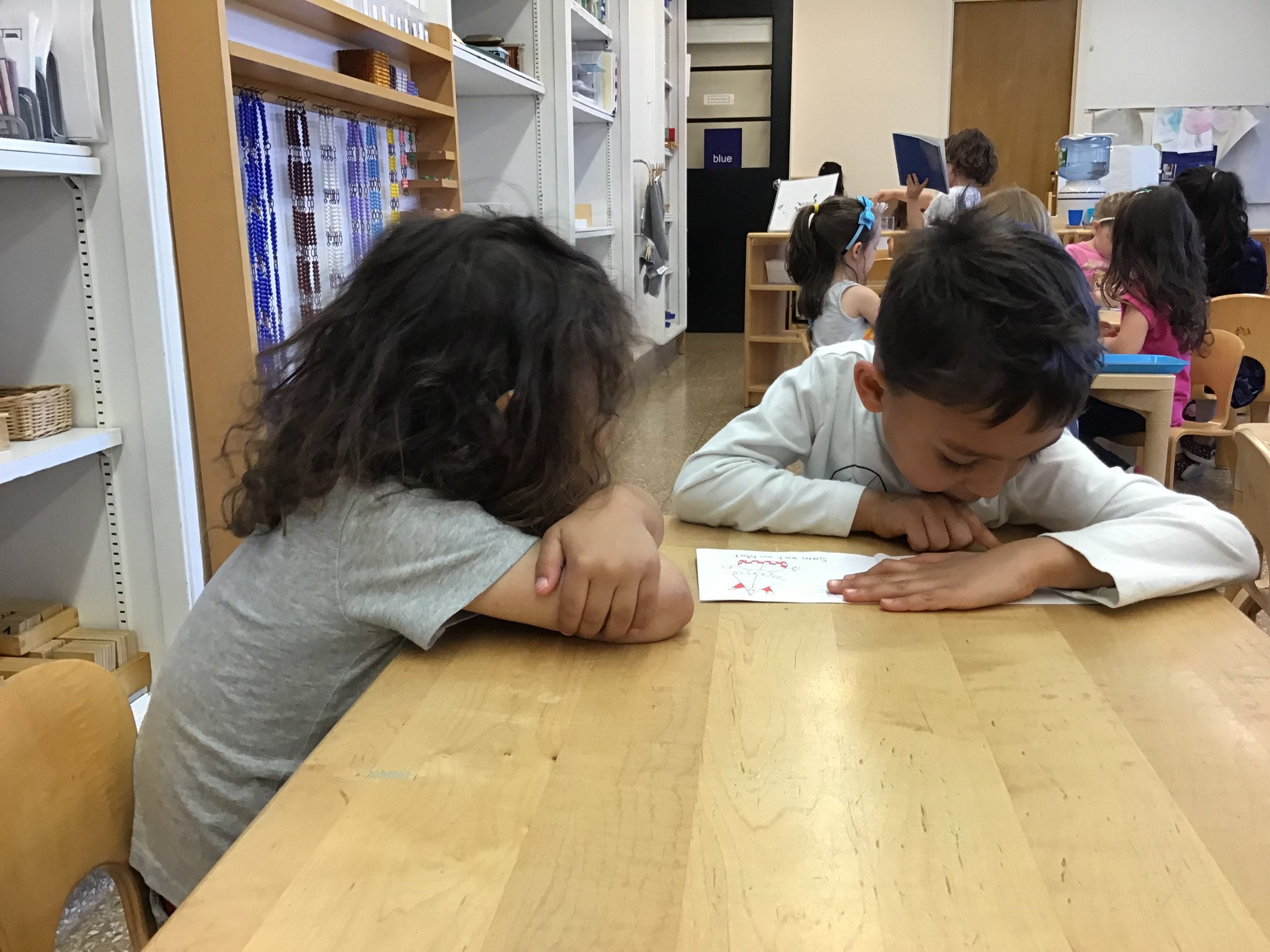 Reading to a younger friend....