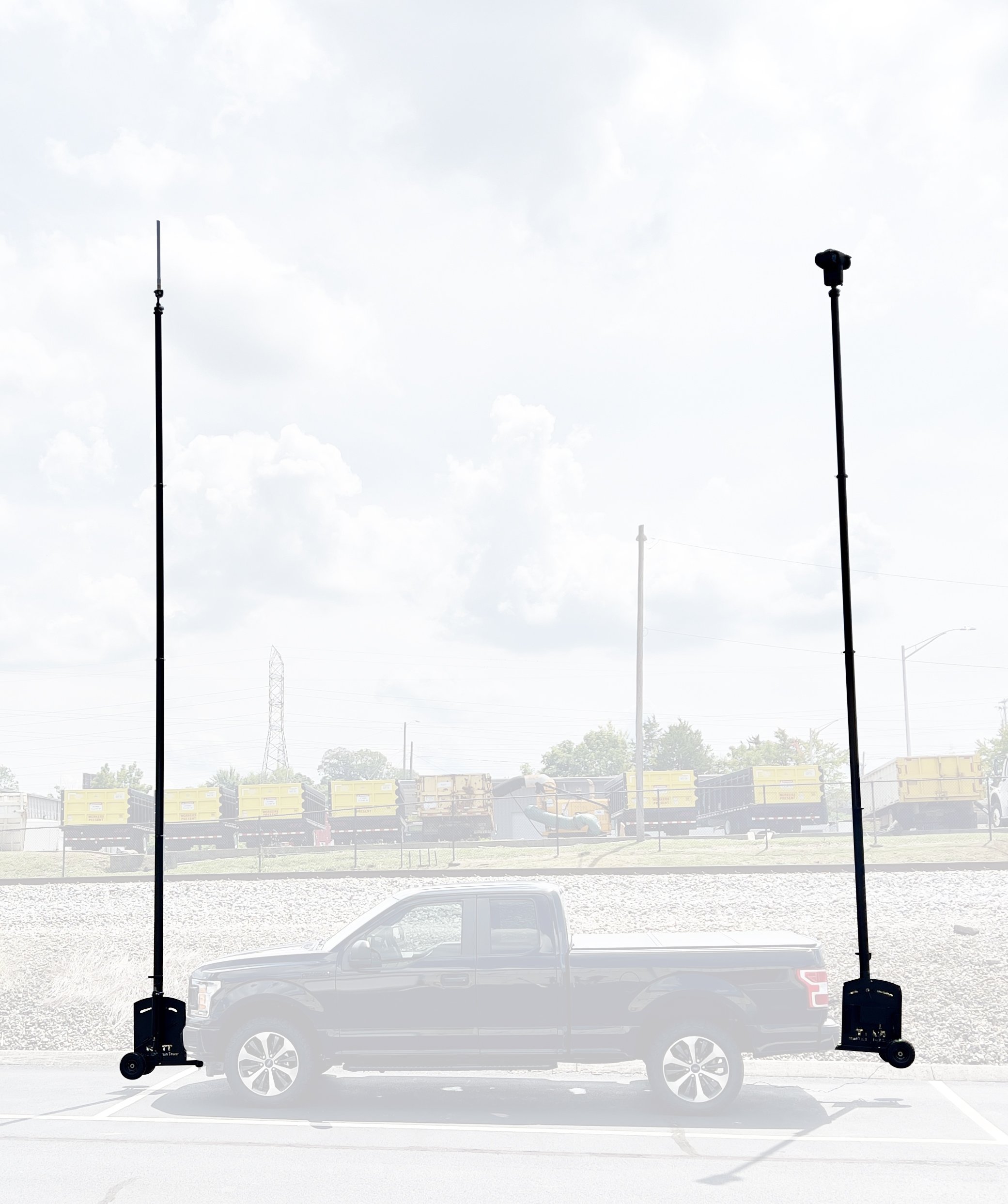 F-150 truck with 30 foot 9 meter RATT mobile tower system on rear hitch and dront hitch with P25 antenna and RATT RQ621 Axis Q6215-LE PTZ surveillance camera Knoxville 8-2022.jpg