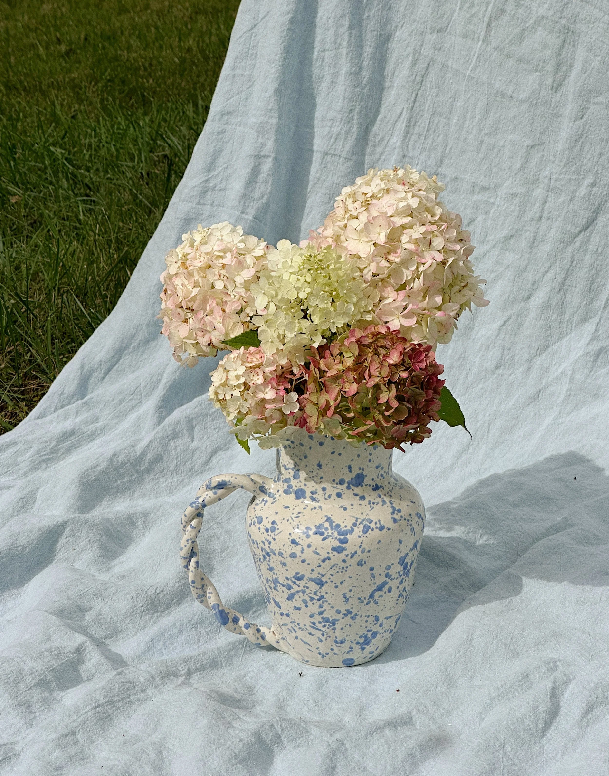 ✨New✨ Splatterware Twist Pitcher ~~ 

this Pitcher Vase adds playfulness &amp; character, yet doesn&rsquo;t overpower the beauty of our autumnal hydrangeas 🍁🍂 a match made in heaven <3

I have a couple of these babies to shop in person this week