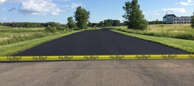 What Does Sealcoating Asphalt Actually Do? The Honest Answer Most Companies Won't Give You