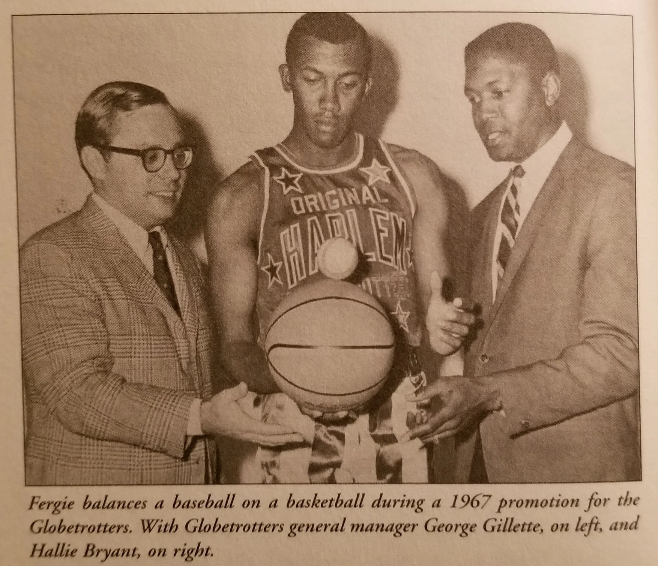   Fergie Jenkins was a huge part of the Globetrotter promotional campaign, as pictured here in 1967 with Globetrotter general manager George Gillette, left, and fellow Globetrotter Hallie Bryant. (Photo courtesy The Montreal Star).  