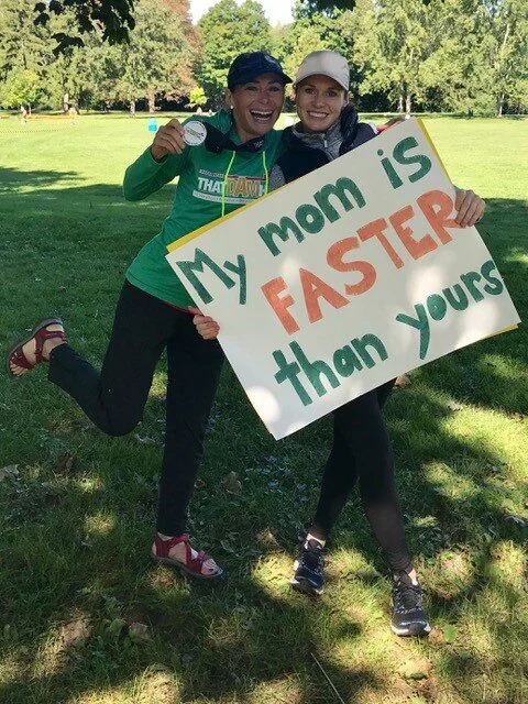  Fitzgerald (left) with her daughter, Diana, after she posted the year’s second-fastest time among Canadian women in the 50-59 age bracket.  (Photo courtesy Clara Fitzgerald).  