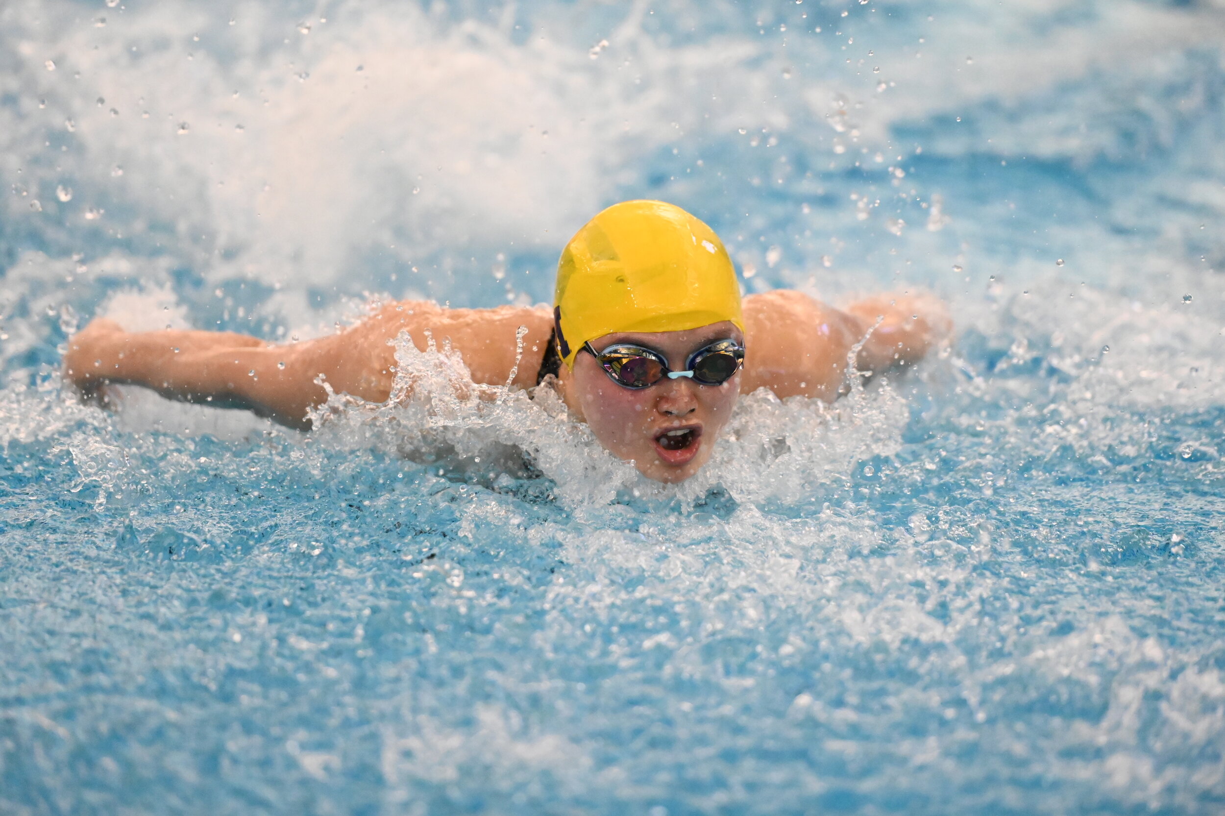 MacNeil adds NCAA champ – twice – to her resume