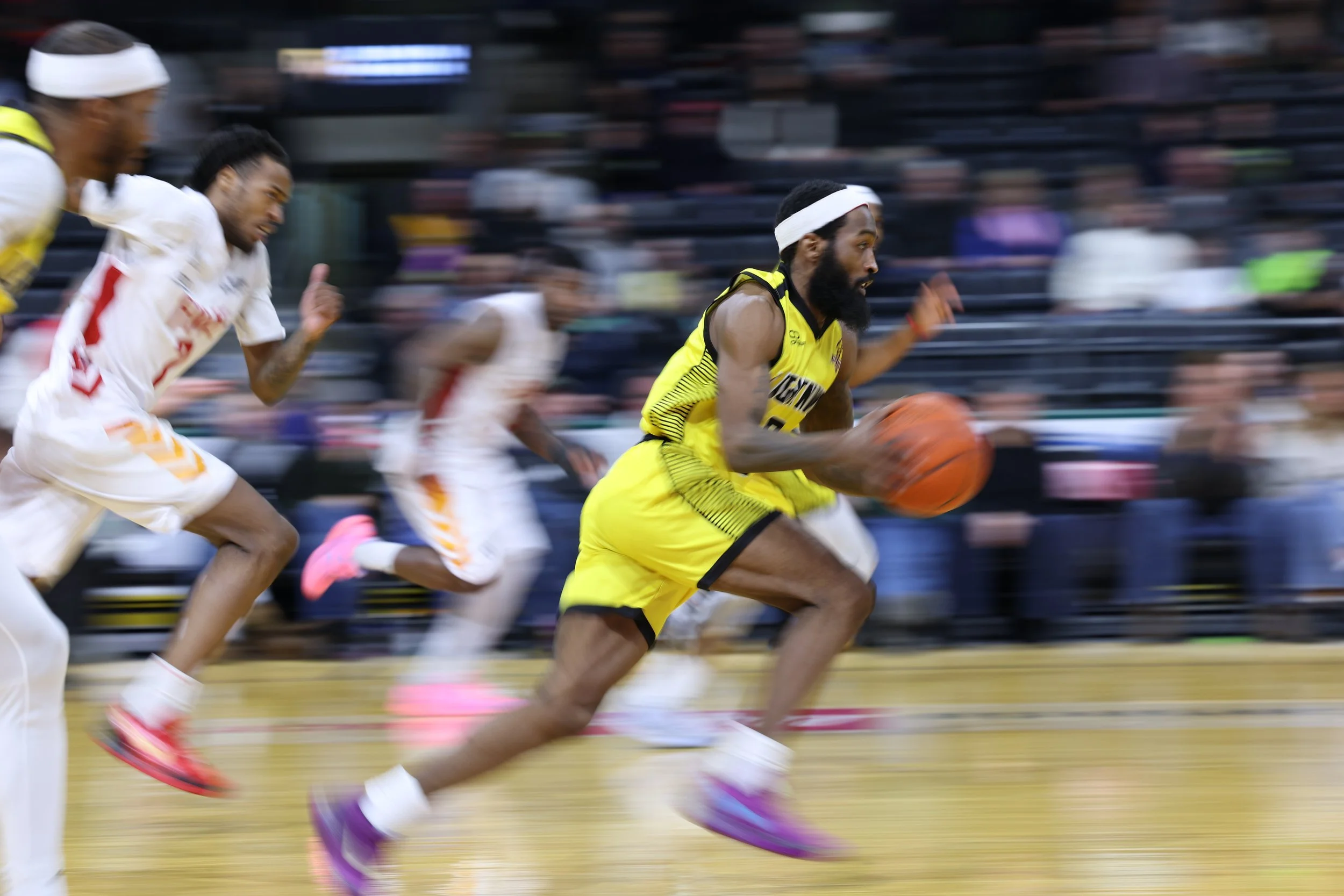   James Towns II streaks up the court in a game vs. Sudbury Feb. 11, 2025. (Photo: Luke Durda).  