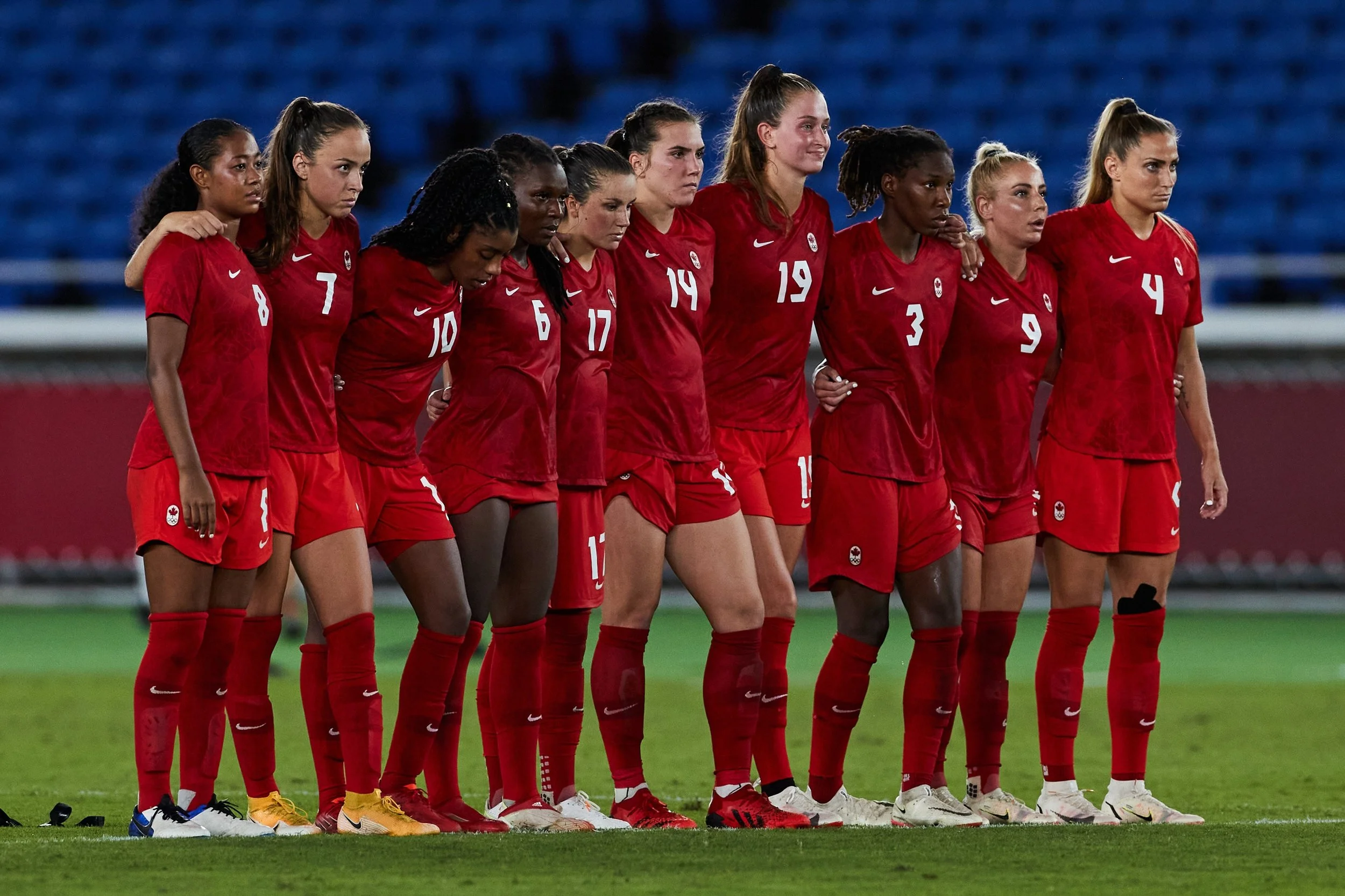   Zadorsky, on the end, focuses during tense penalties at the Tokyo Olympic Games. (Photo: Canada Soccer by Mexsport).  