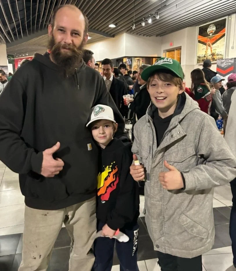   Chris Refflinghaus attends a London Knights game along with his sons, 13-year-old Ryker (right) and 8-year-old Kai (middle). (Photo courtesy Chris Refflinghaus).  
