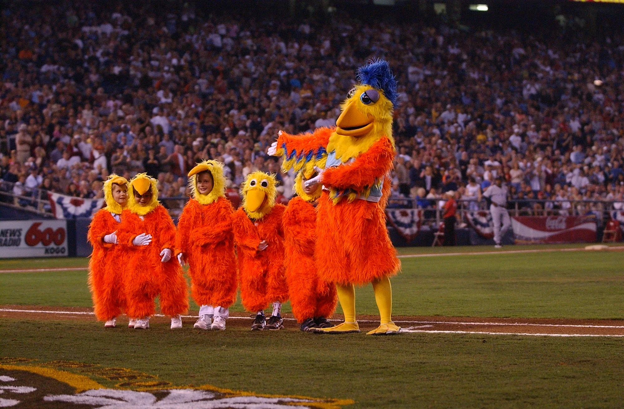   The Chicken, joined by some baby chicks, at a Major League Baseball game (Photo courtesy Ted Giannoulas).  