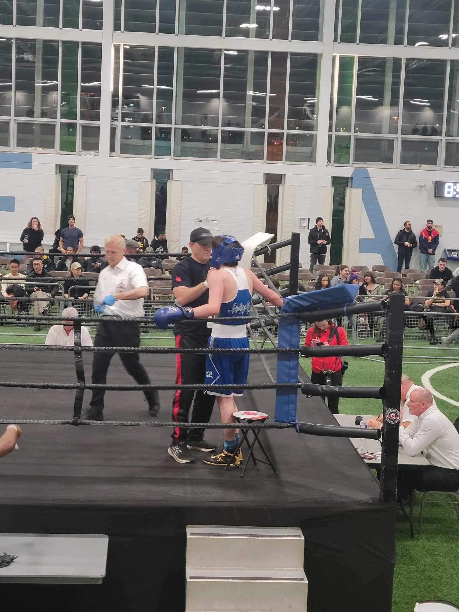 Leading Edge Boxer and Coach between rounds