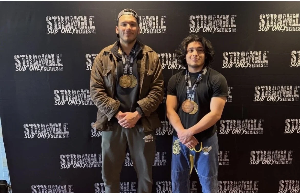 Two Leading Edge BJJ students winning gold and bronze medals