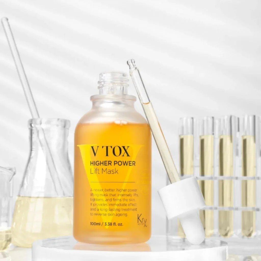 This photo is of v top Korean skin care with beakers in the back round.