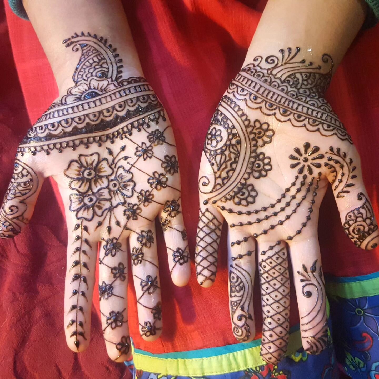 You can catch me doing henna this Saturday, August 19, 2023 from 5:30-7:30pm for this event: https://www.caponiartpark.org/jawaahir-dance-company/

Henna is priced per design. Admission for the event is $10. Come get some beautiful henna and enjoy a 