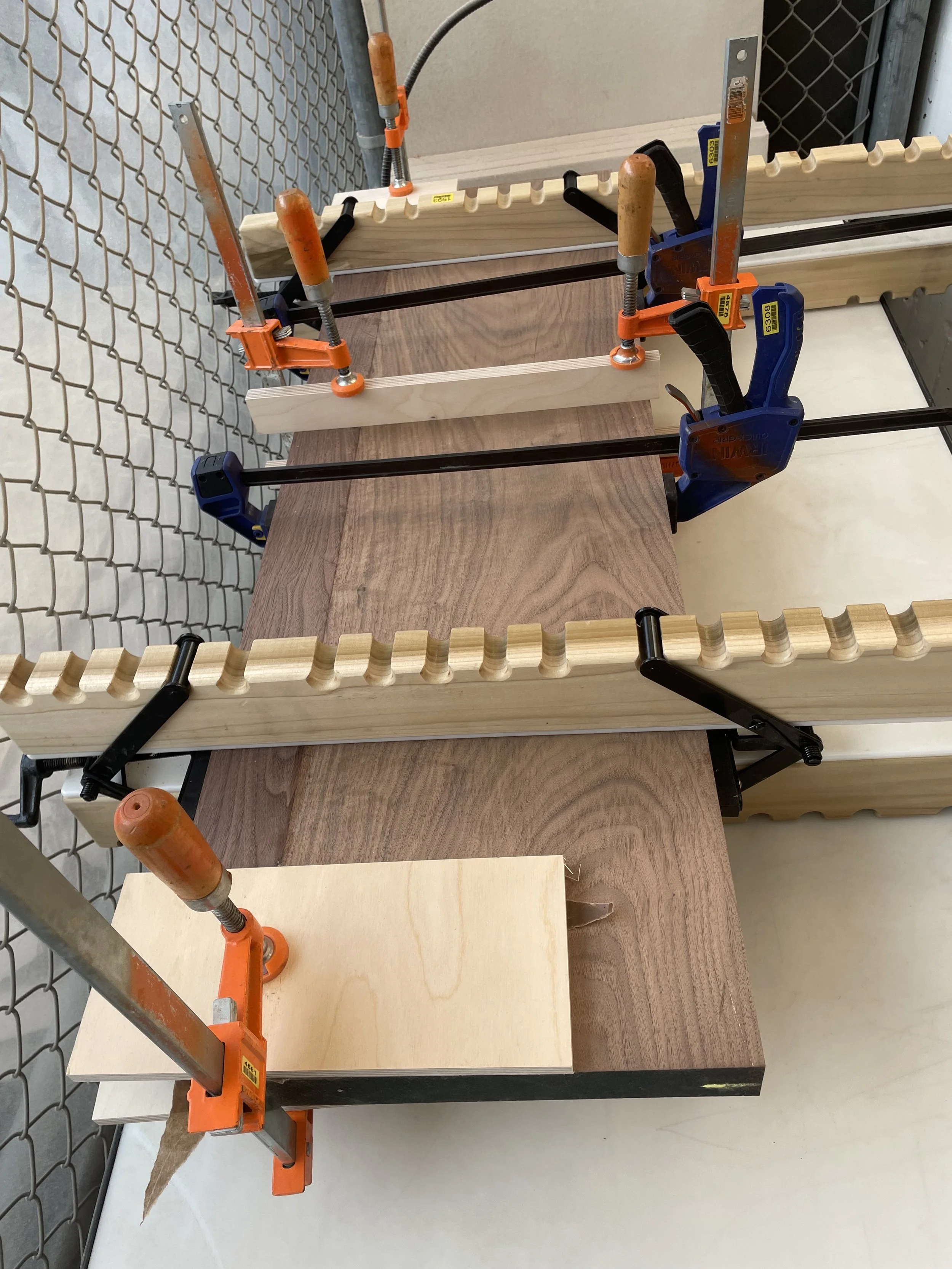 Made from Walnut with Mortise & Tenon connections and Tongue & Groove joints