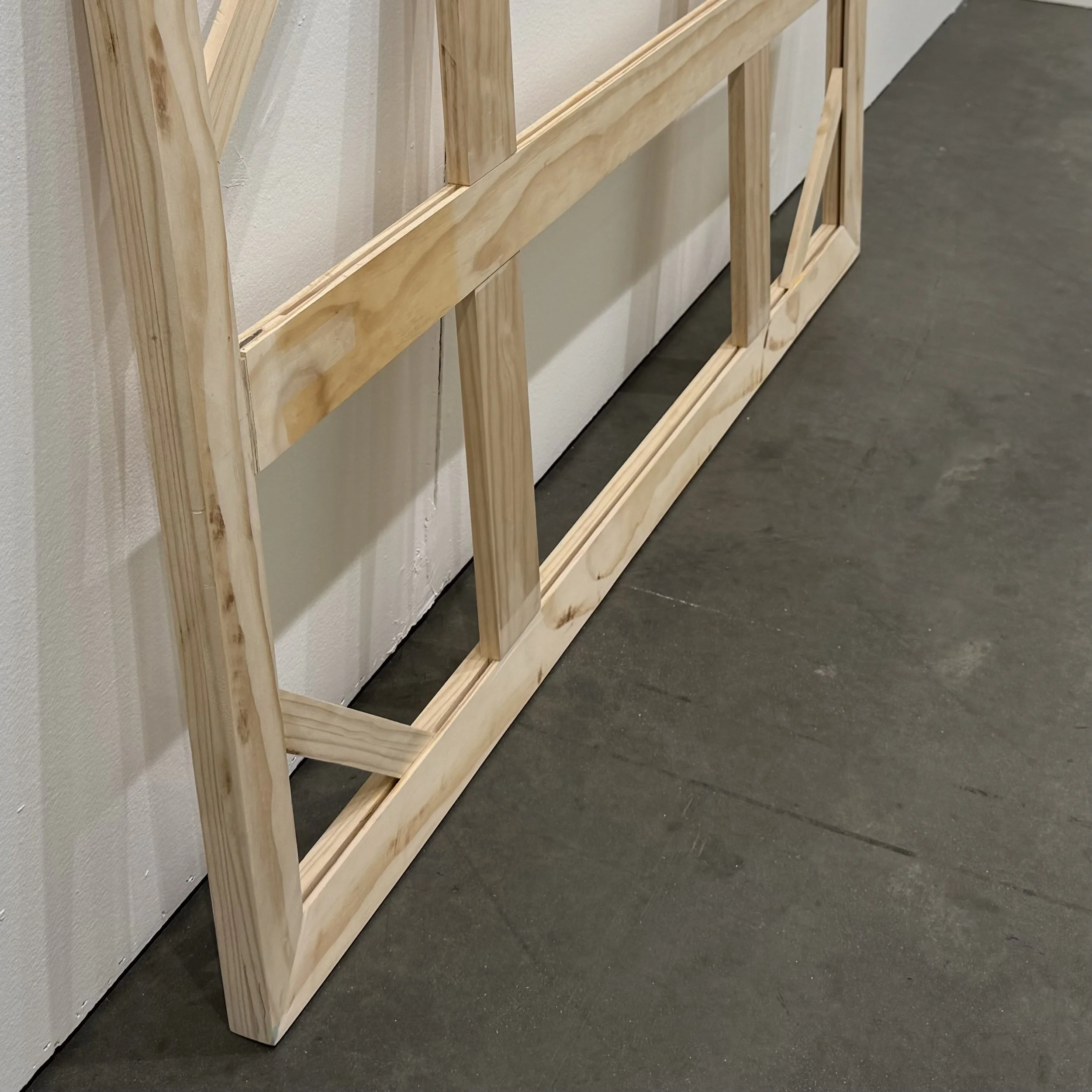 Made from Pine, with beveled edge to hide frame behind the artwork