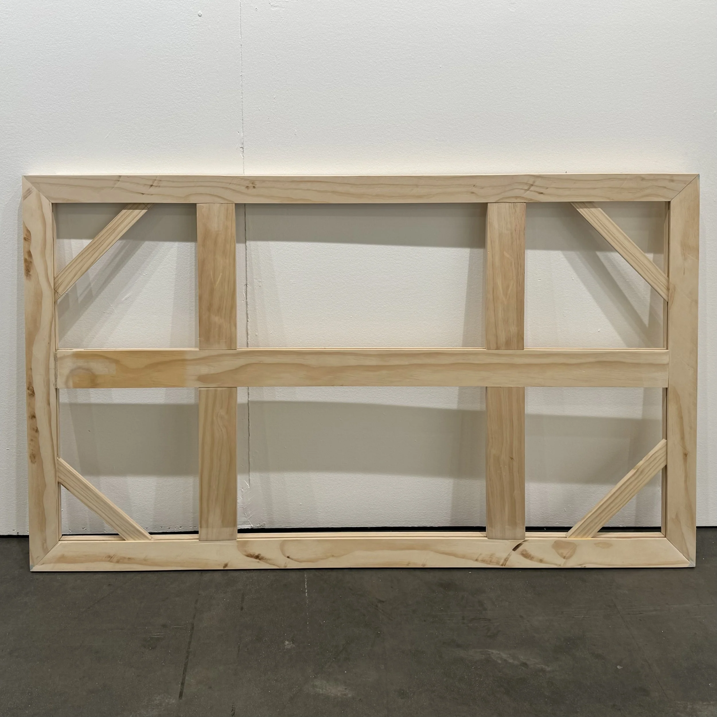 Made from Pine, with beveled edge to hide frame behind the artwork
