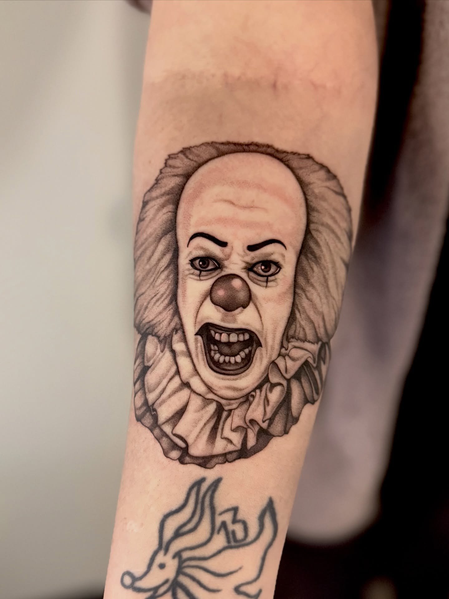 - Pennywise (1990) 

-

#pennywisetattoo #portraittattoos #portraittattooartist #blackngreytattoo #realismtattoos