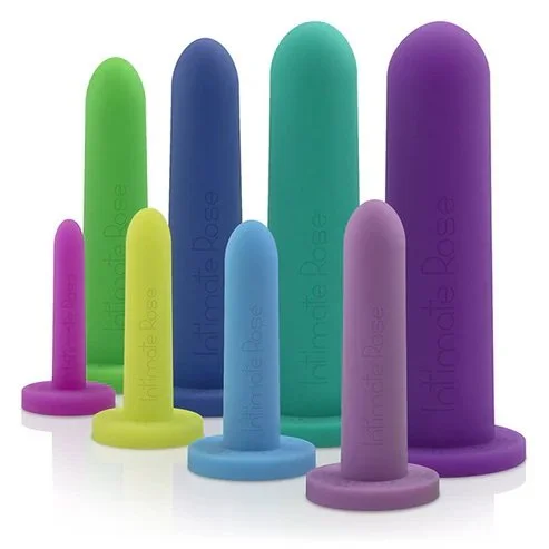 A collection of colorful silicone sex toys in various sizes, including small, medium, and large, arranged on a white background.