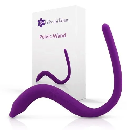 A purple pelvic wand sex toy in front of its packaging, which features a similar shape and the brand name "Intimate Rose."