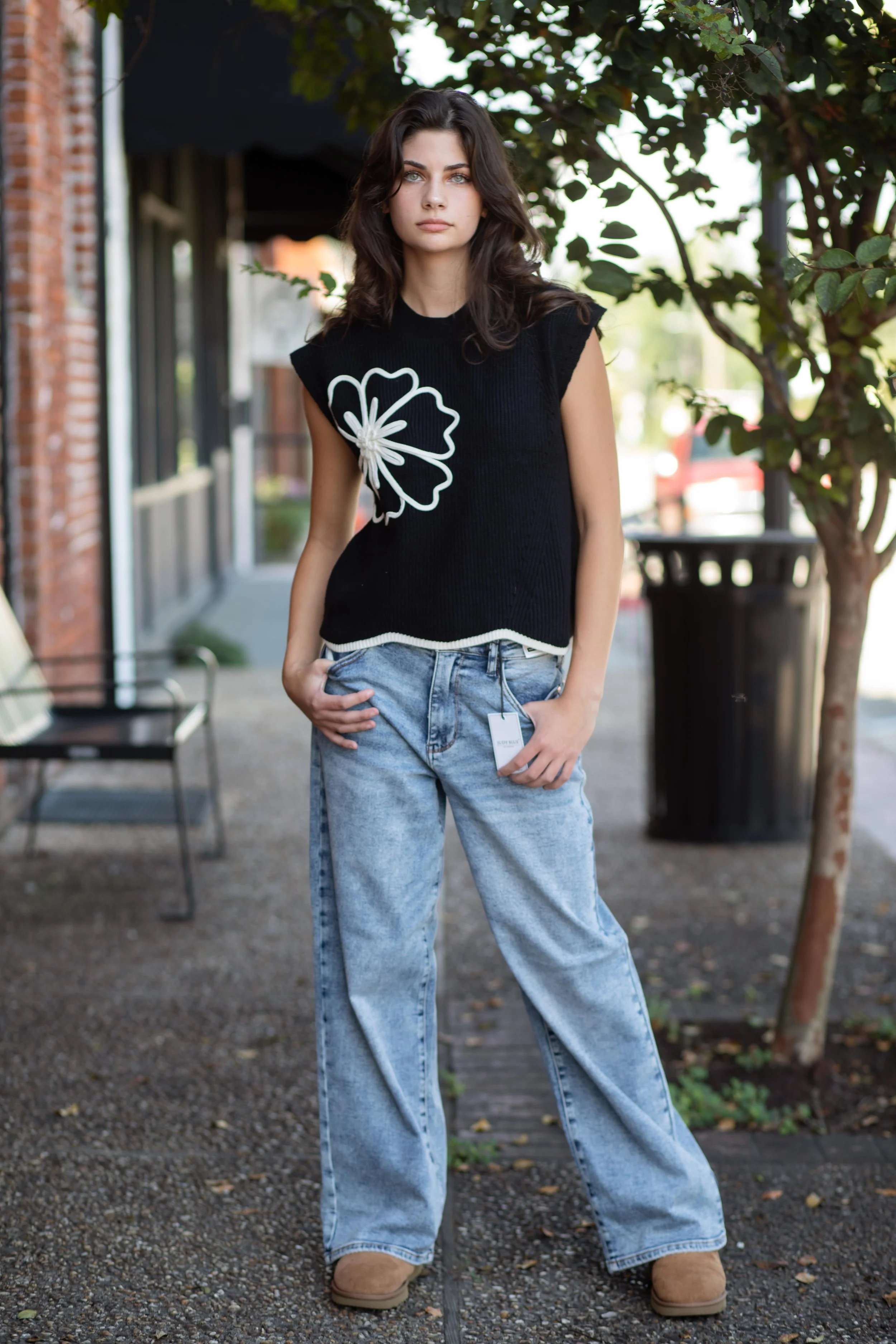 Black Drop Shoulder Sweater Top with White Floral Appliqué and Scallop Hem