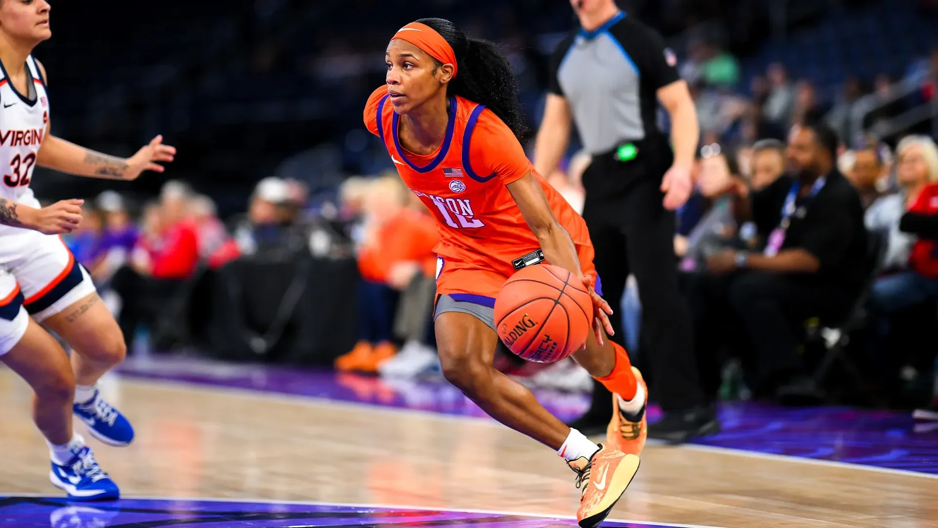 Mia Moore clemson basketball moving basketball on court