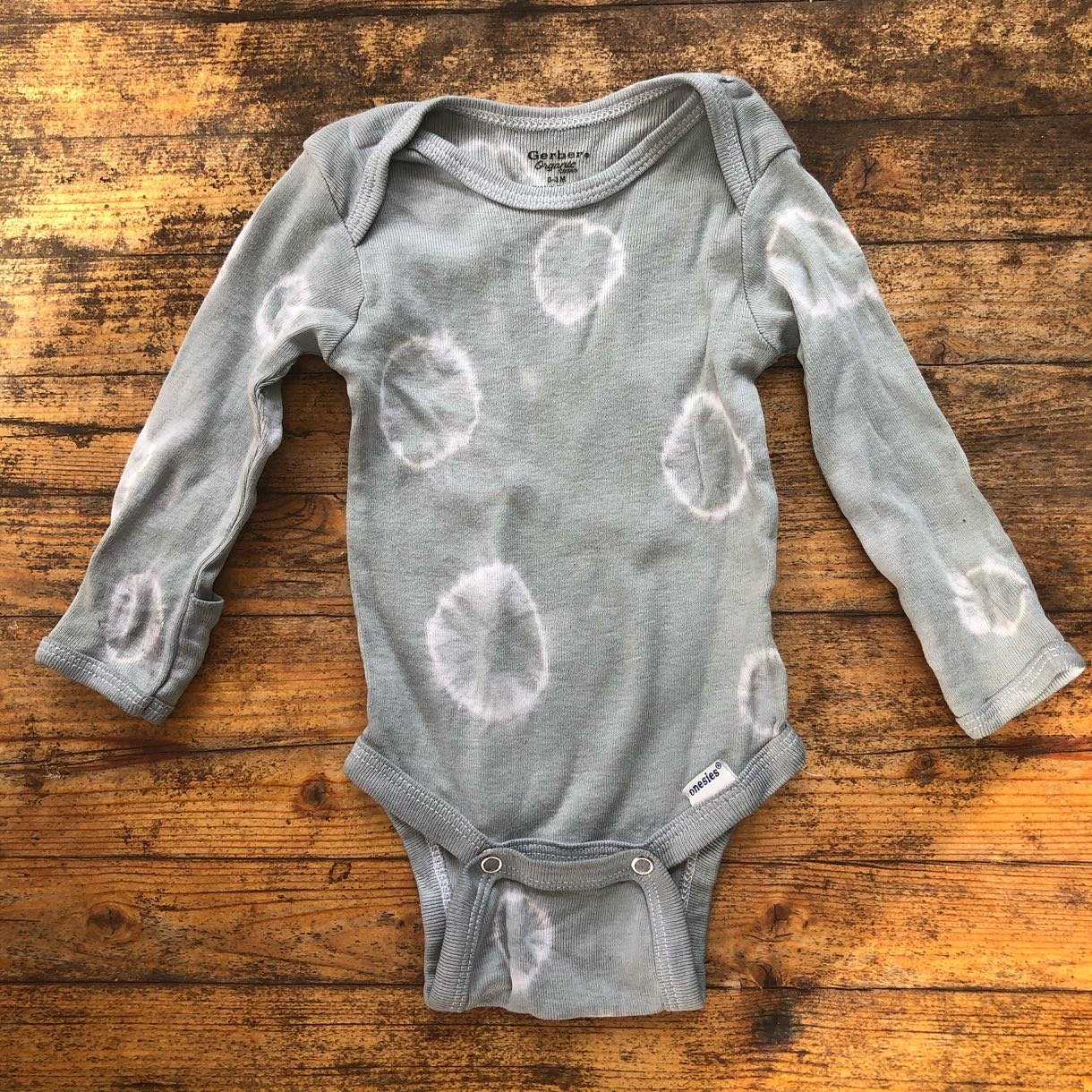Onesie dyed with Hollyhocks