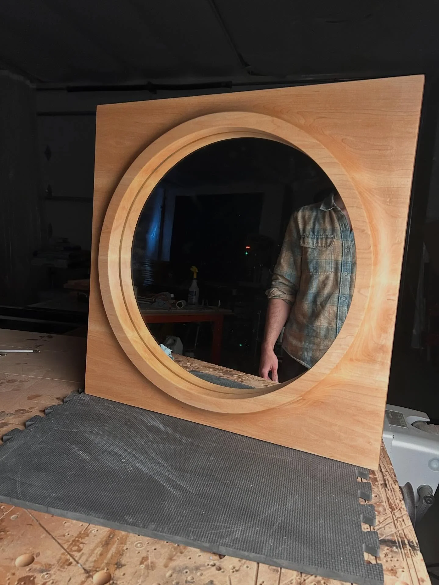 Portal Mirror in Maple. A lot of hand sanding goes into this piece, but there&rsquo;s something deeply satisfying about watching a rough chunk of wood slowly erode into soft flowing edges.
.
.
#furnituredesign #mirrordesign #homedecor