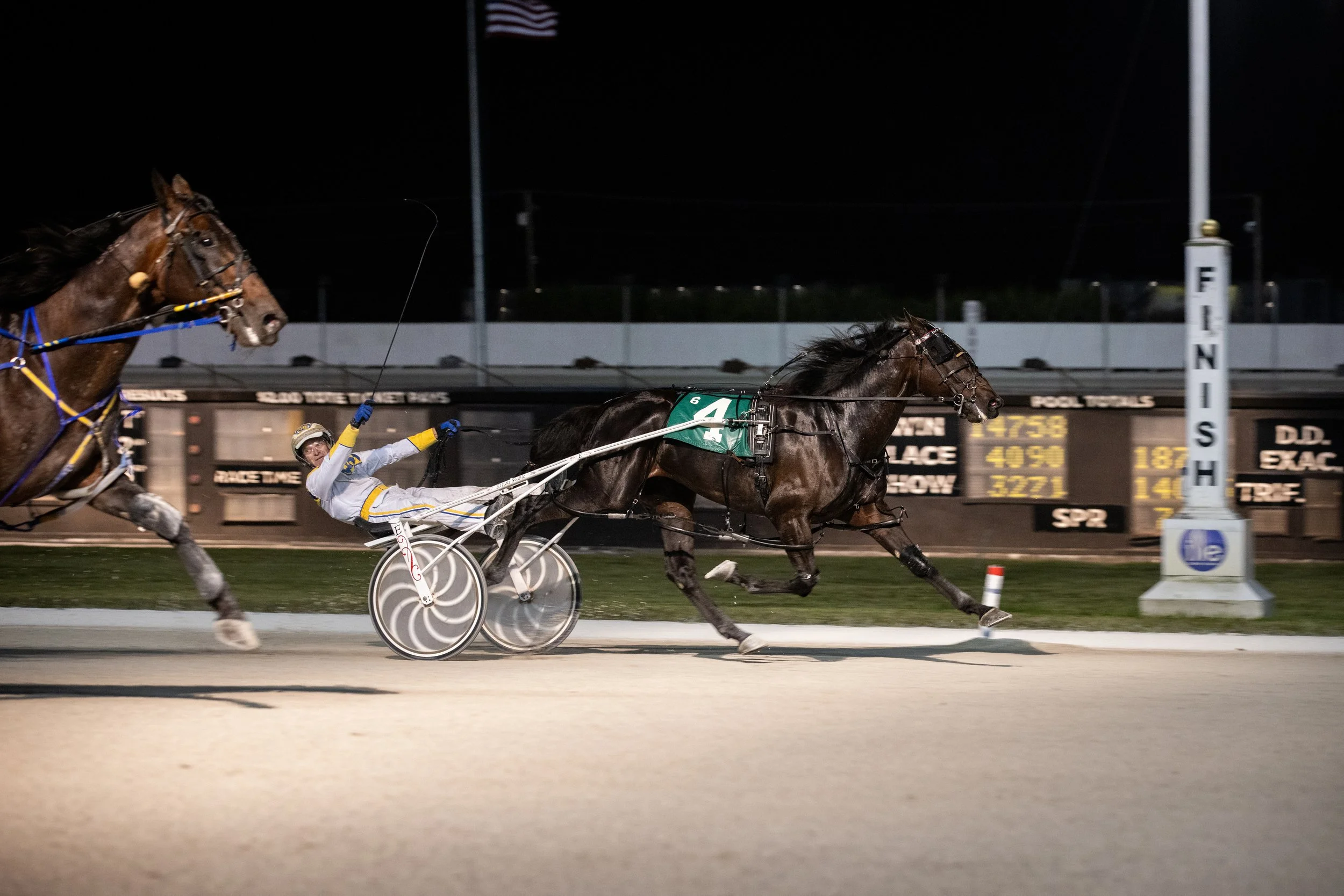 Beach Forecast and Wally Hennessey win the final race at Pompano Park