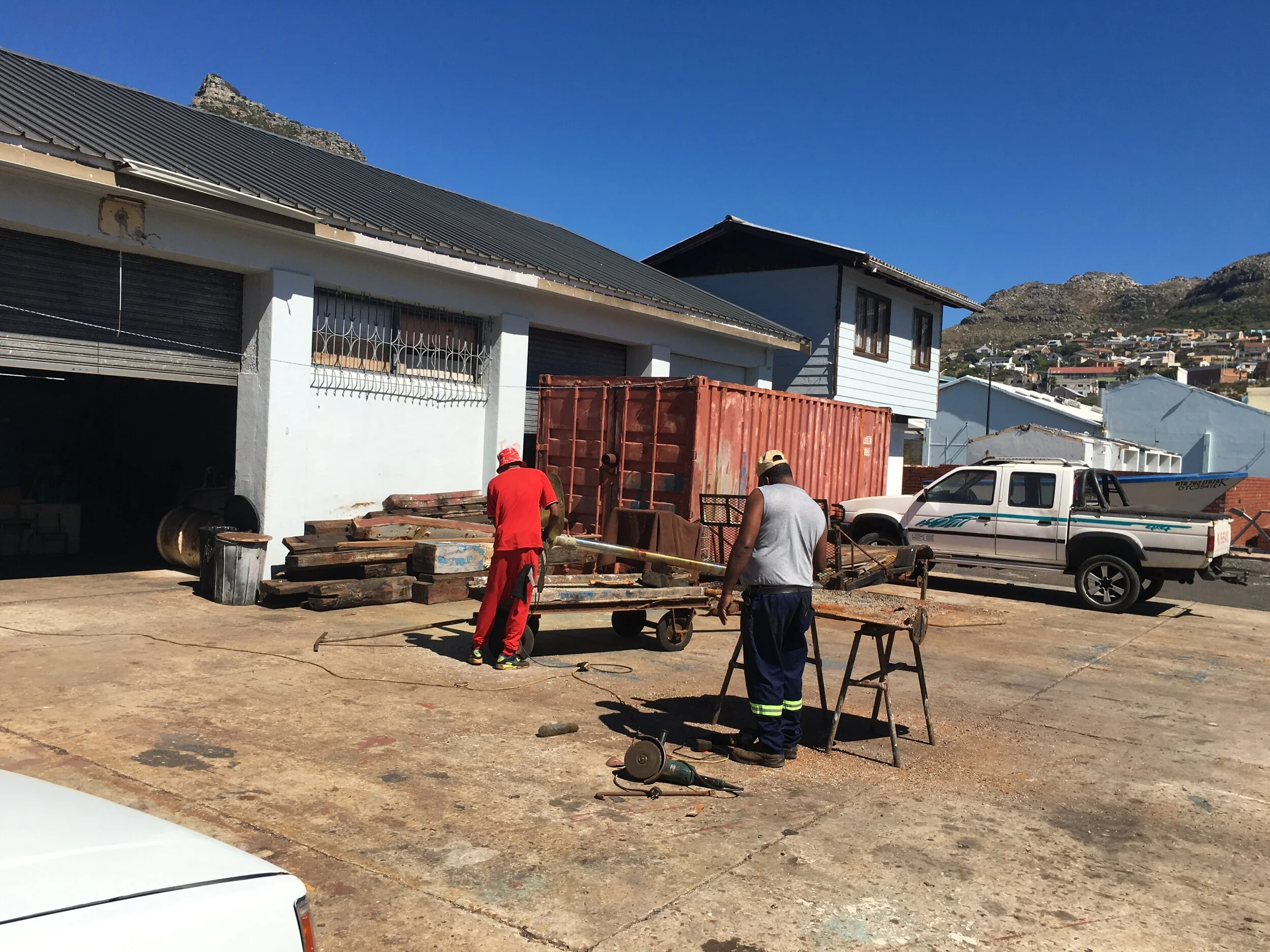 Maintenance work being done to a propeller shaft on the waterfront