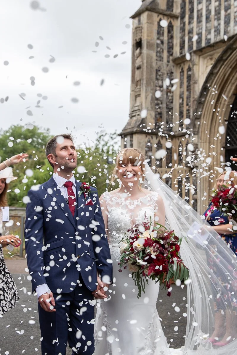 Mr & Mrs Smith candid confetti shot outside of St Margaret's Church Lowestoft