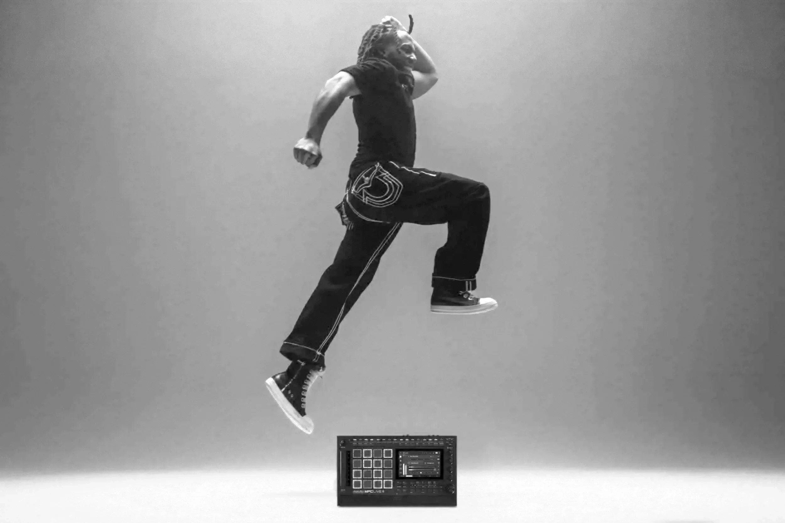 Beats by JBlack mid-air above an MPC