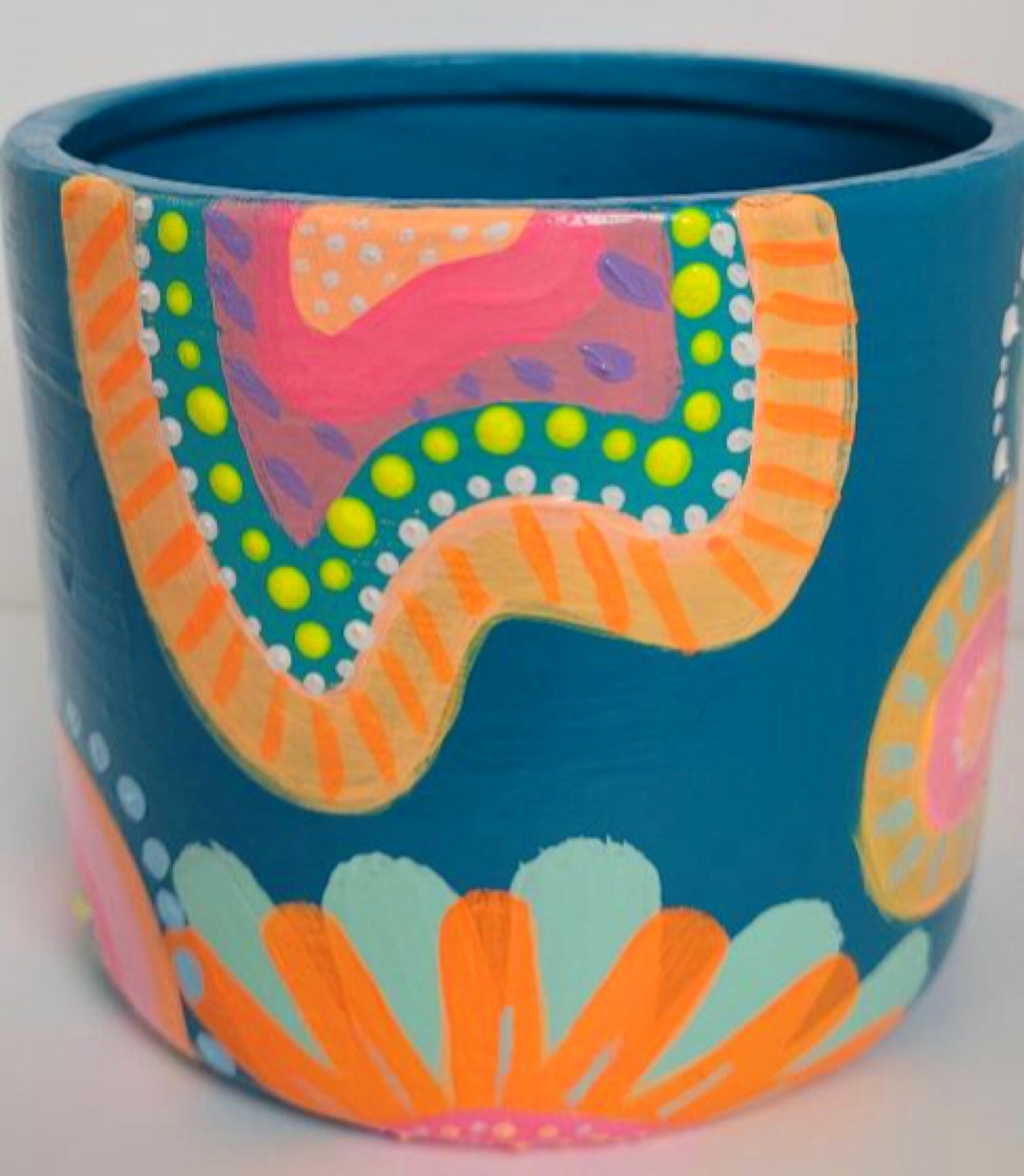 Fun exclusive handpainted ceramic plant pot turquoise with organic shapes, abstract flowers and neon colours
