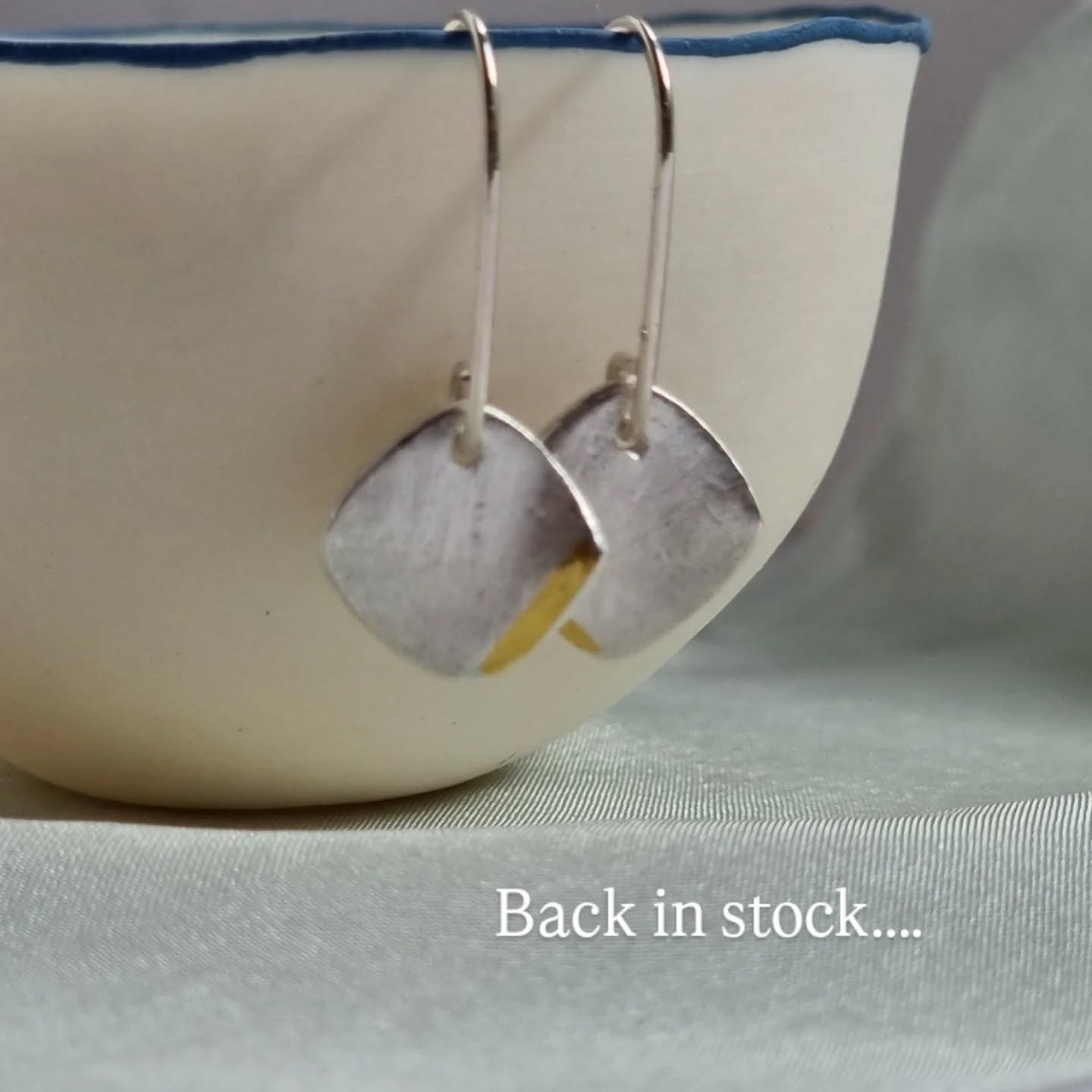 Simple little fine silver nearly-squares with a touch of 24ct gold.

In anticipation of my imminent webshop update, I've re-listed these earrings now. Always weird to say 'back in stock', when it's actually because I've finally found time to make som