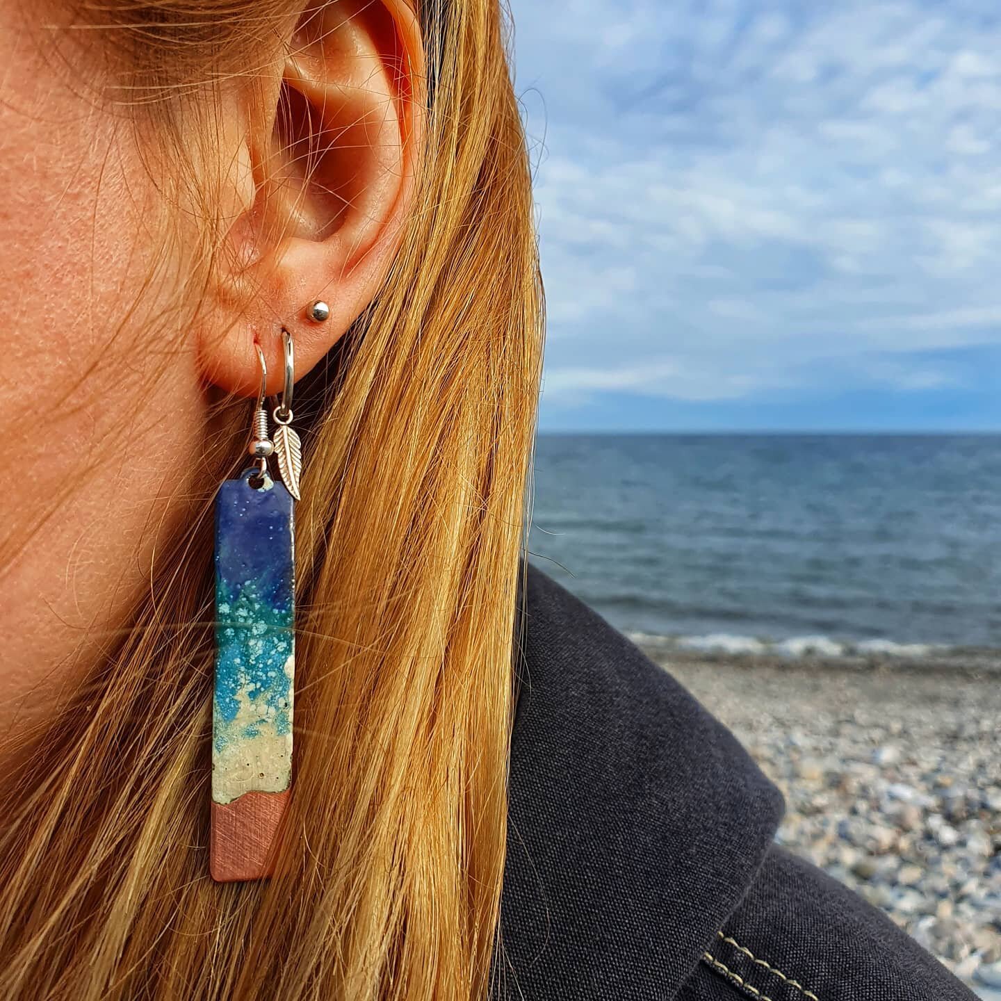 Seascape earrings modelled by the lovely Sadie by the actual sea!
