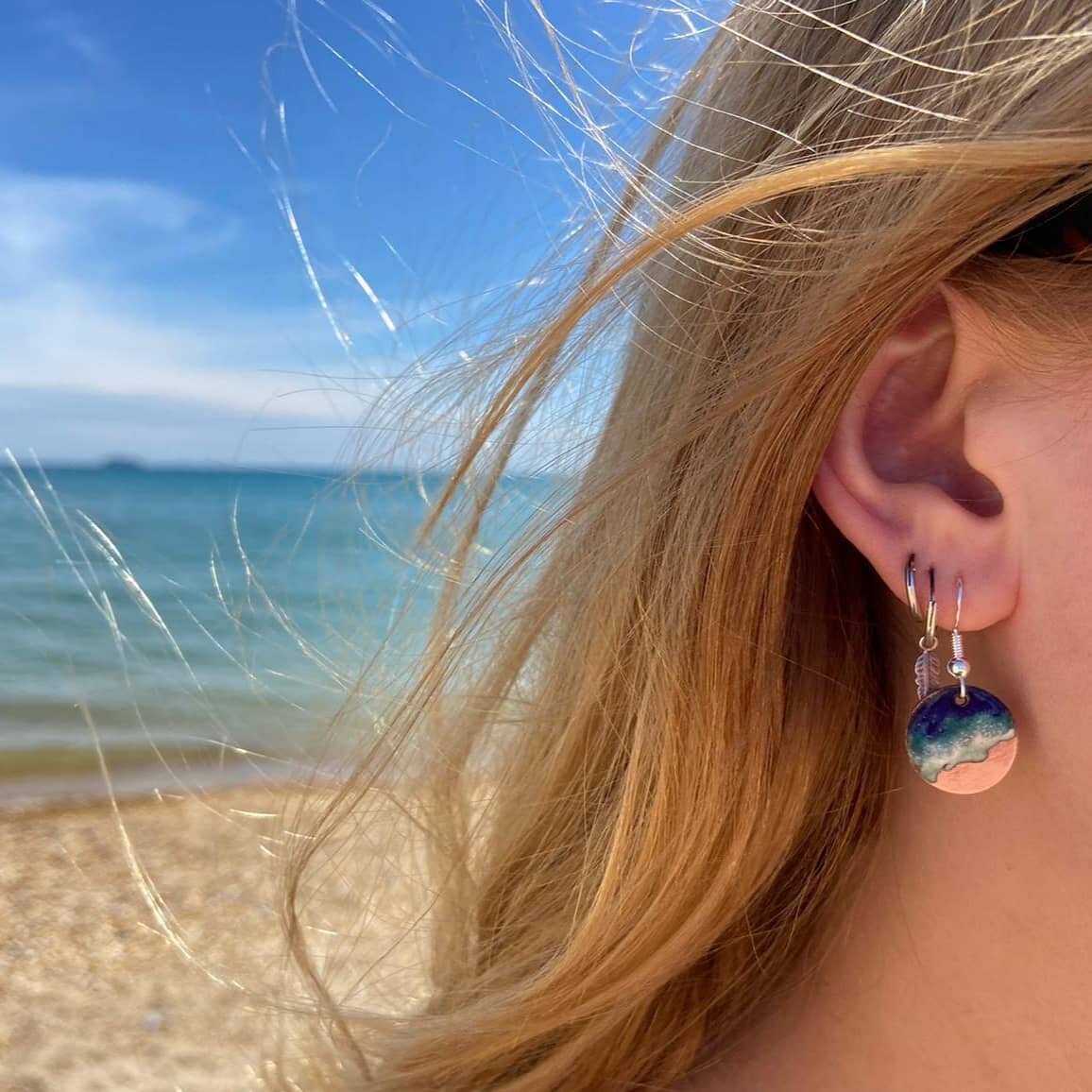 Handmade enamel seascape earrings modelled by the lovely Sadie, by the lovely sea, in the lovely sunshine. Available in my online store at www.kathwilliamsart.com 

#enamel #enamelartist #handmade #handmadejewellery #handmadeearrings #kilnfired #arti