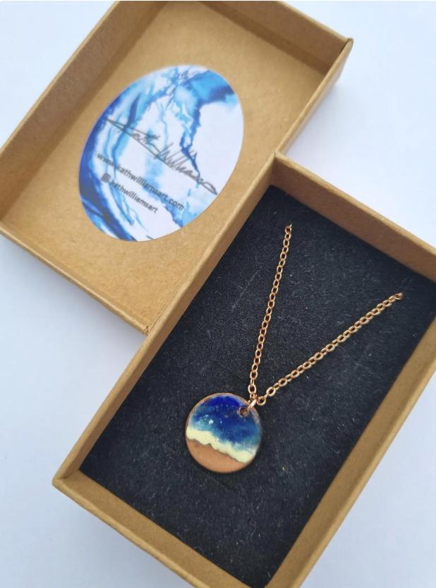 Small+circle+enamel+and+copper+seascape+pendant.png