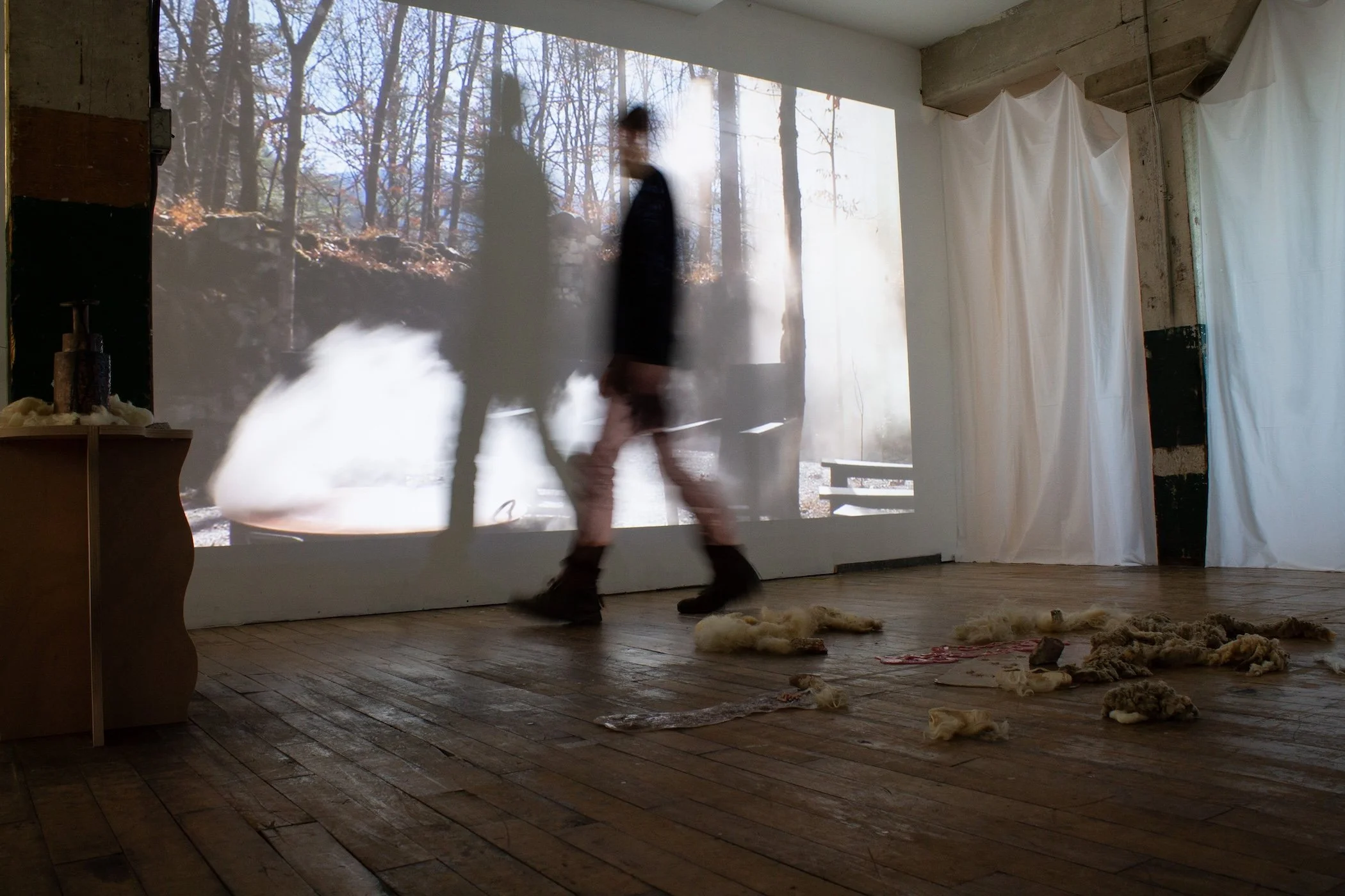Installation view with sculpture and single channel video